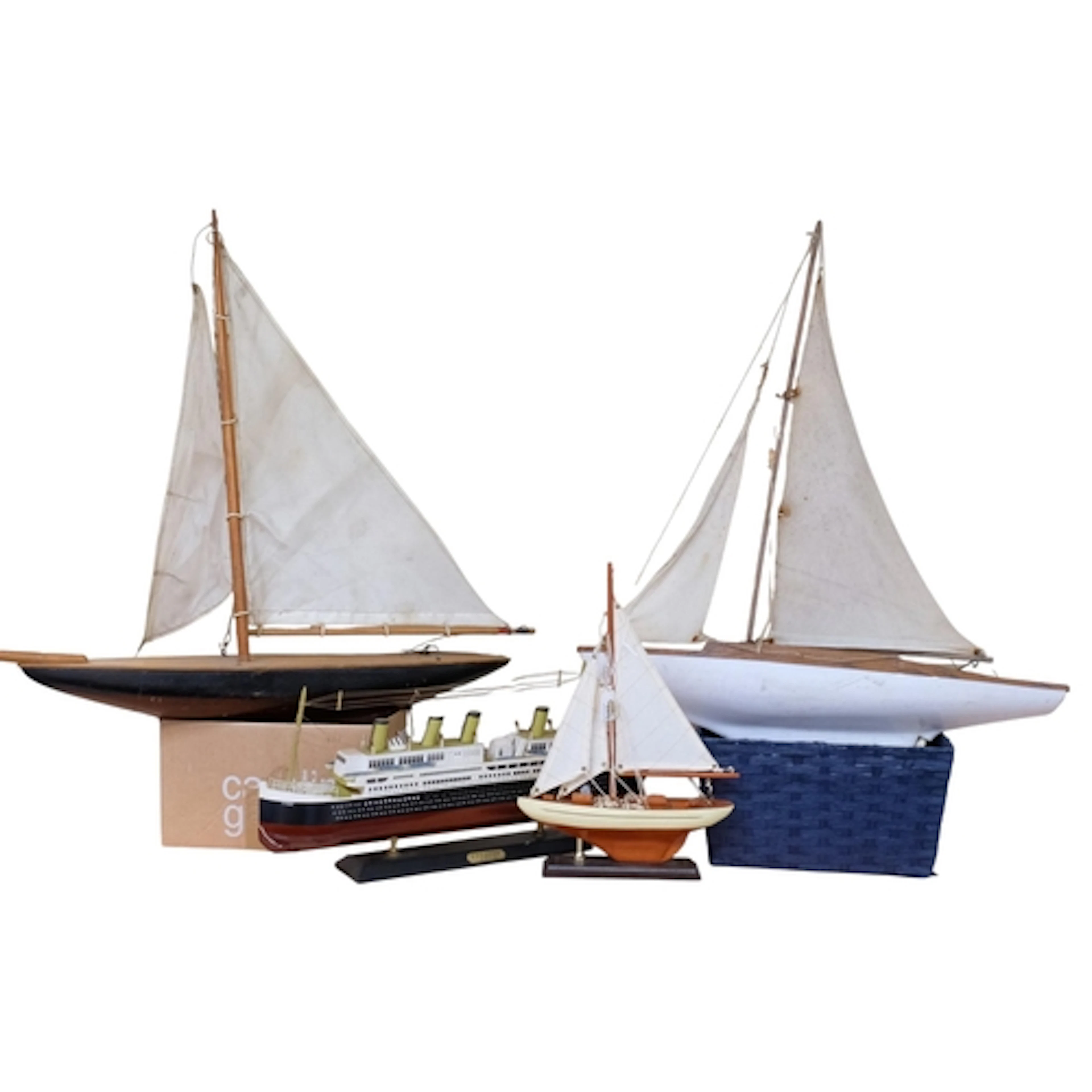 A single-masted plastic pond yacht, hull L59cm and A painted...