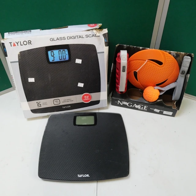 A pack of N-Gage dog toys and a set of black Taylor bath sca...