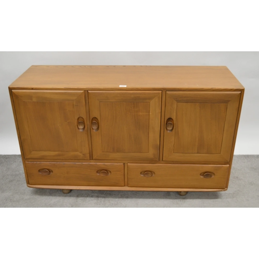 Mid Century Ercol three door sideboard, 130cm wide