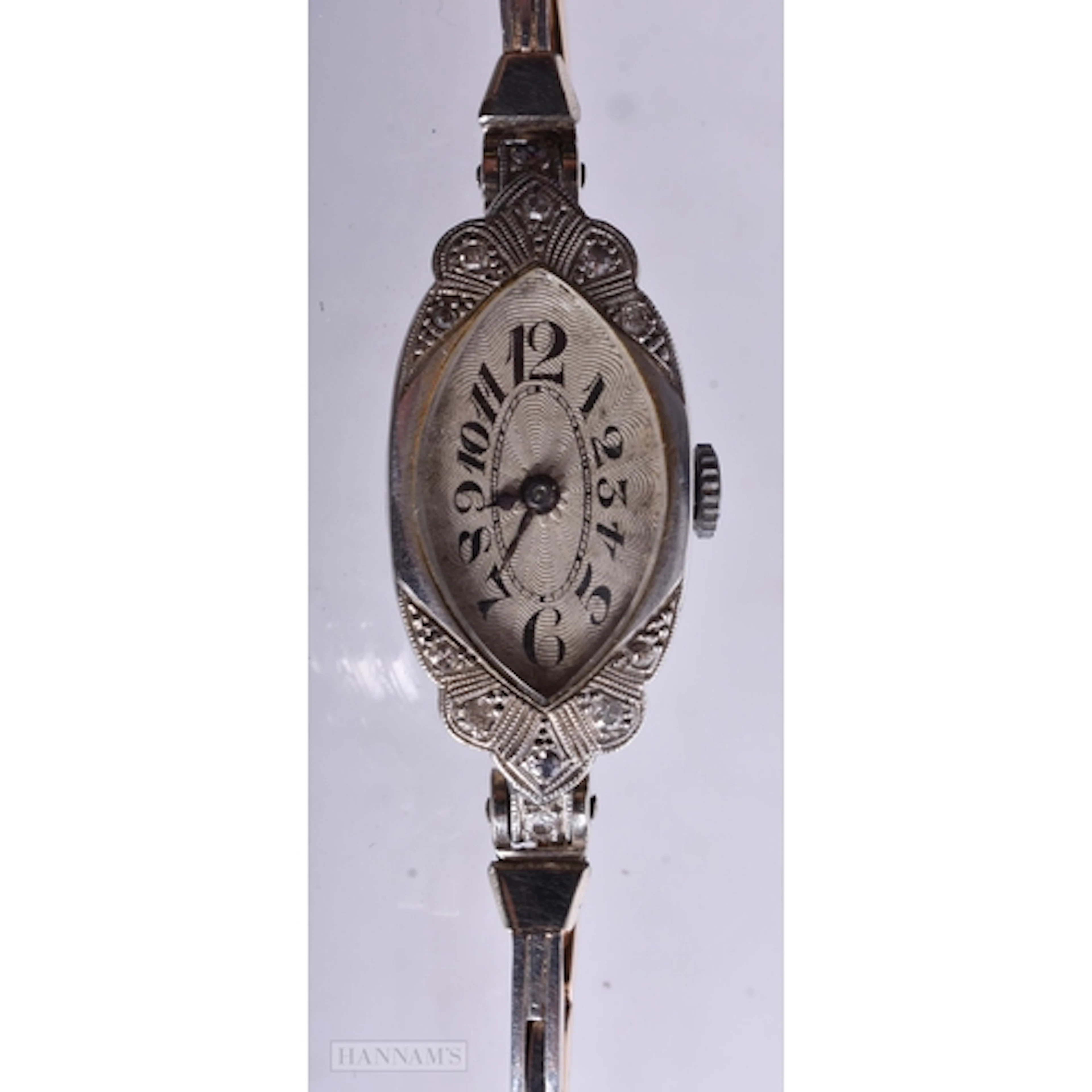 AN ART DECO 18CT GOLD COCKTAIL WATCH with gold strap. 18 gra...
