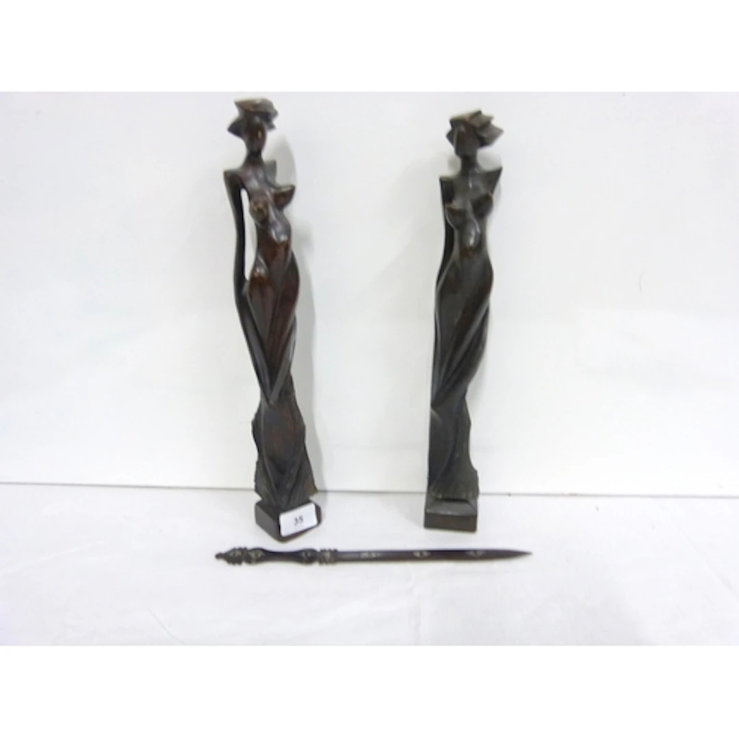 Two hand carved Art Deco figures 38cm and an inlaid letter o...