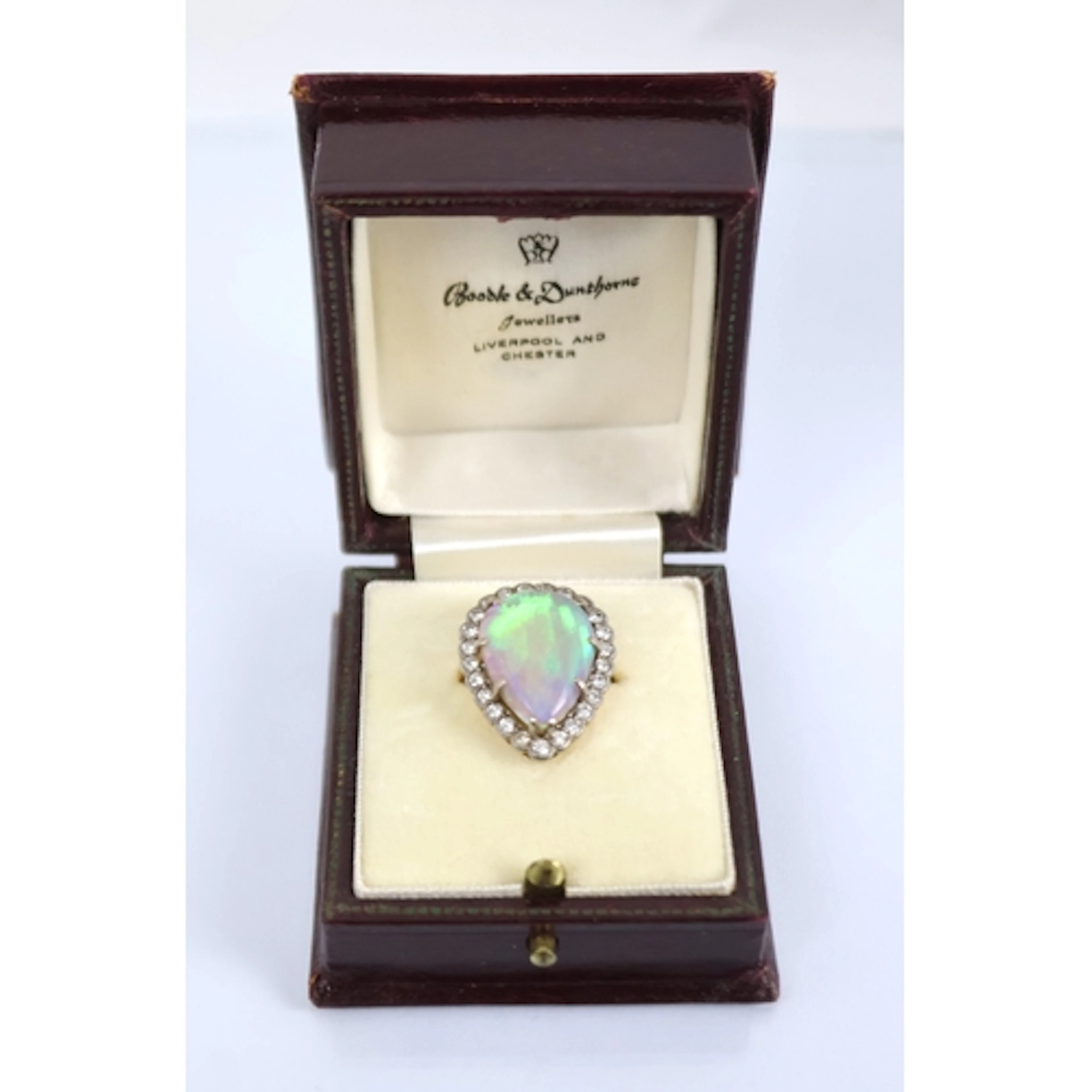 A large opal and diamond pear shaped ring, mid 20th century,...