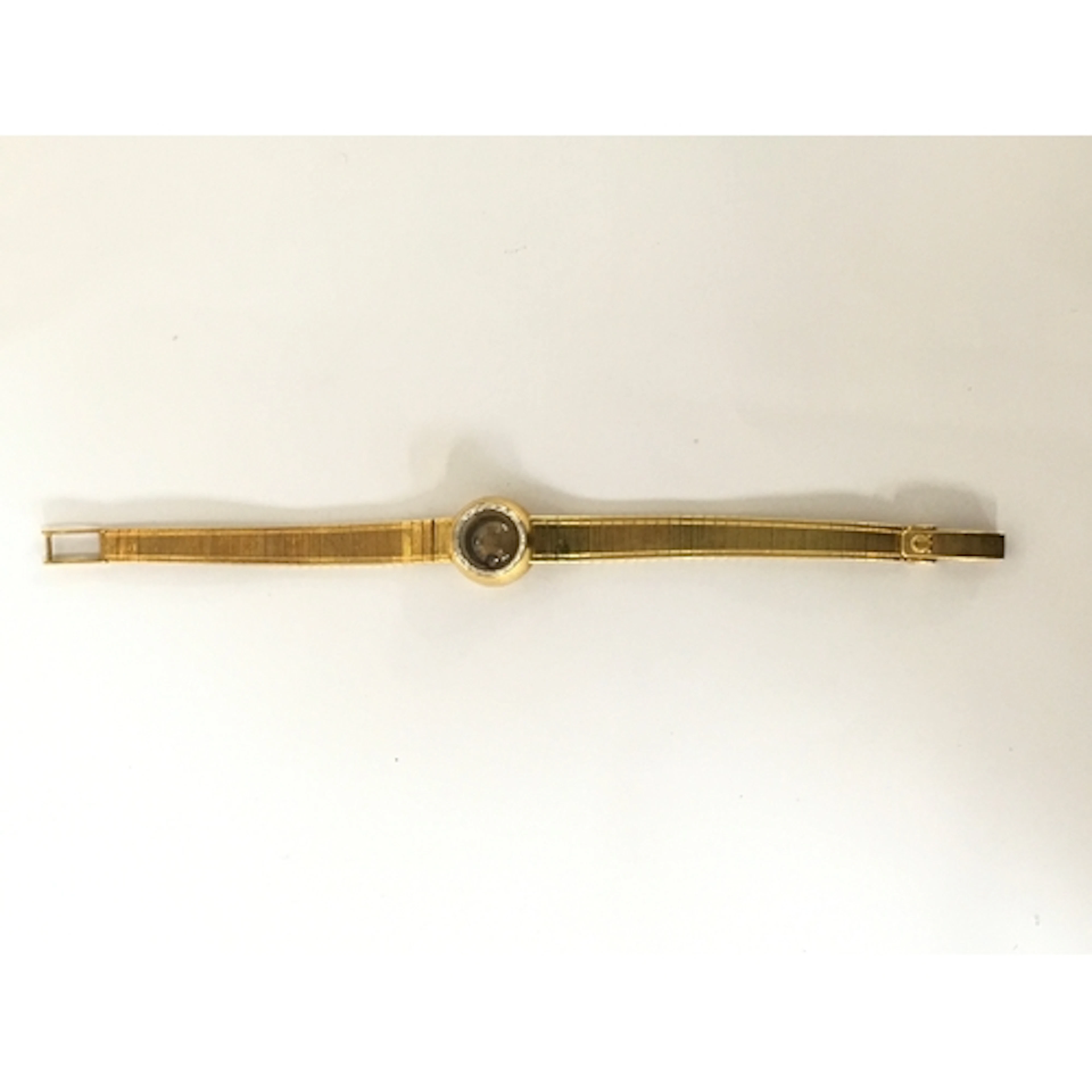 A lady's vintage Omega 18ct gold watch having small domed fa...