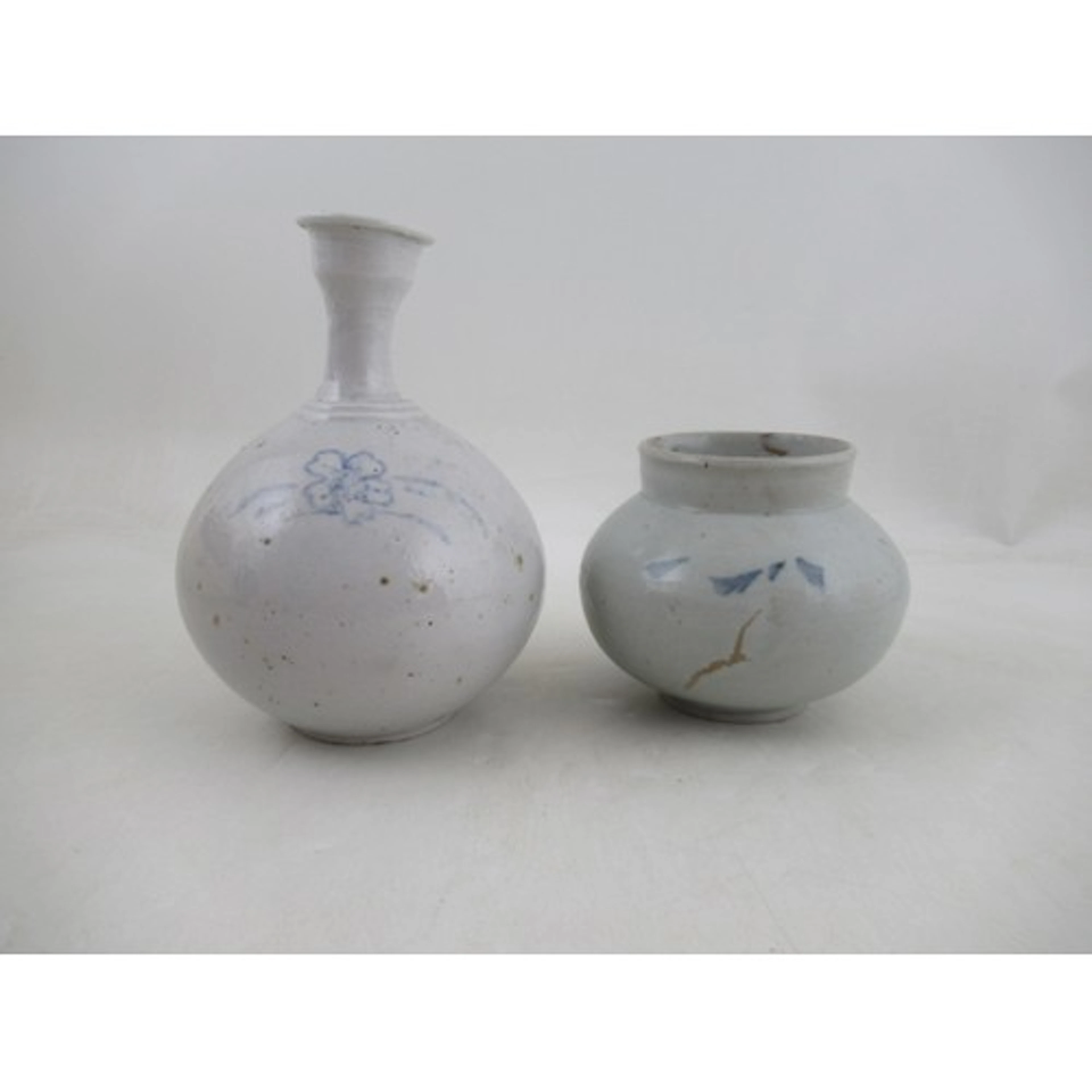 A provincial Eastern bottle vase, together with a small bowl