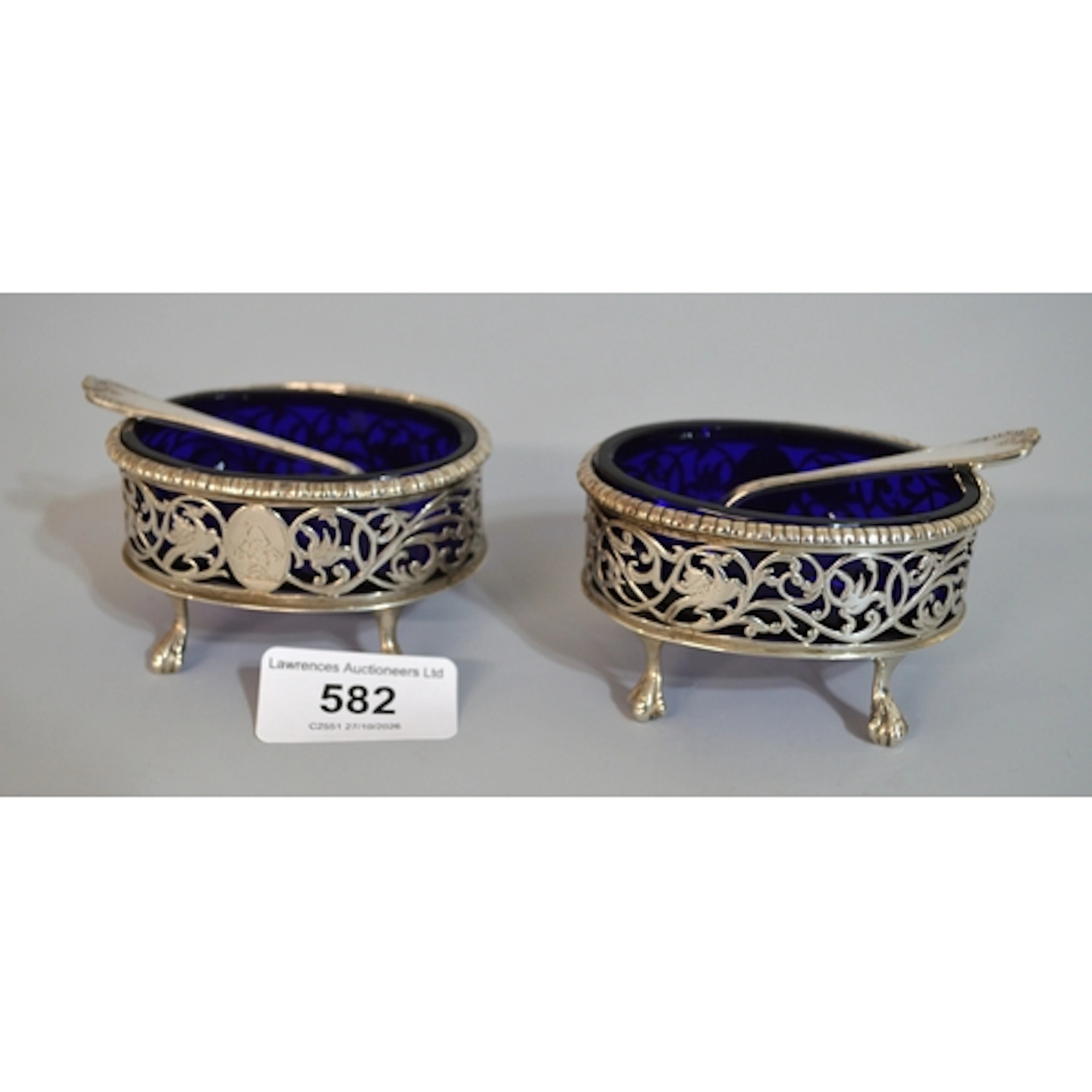 Pair of George III silver oval salts of pierced design with ...