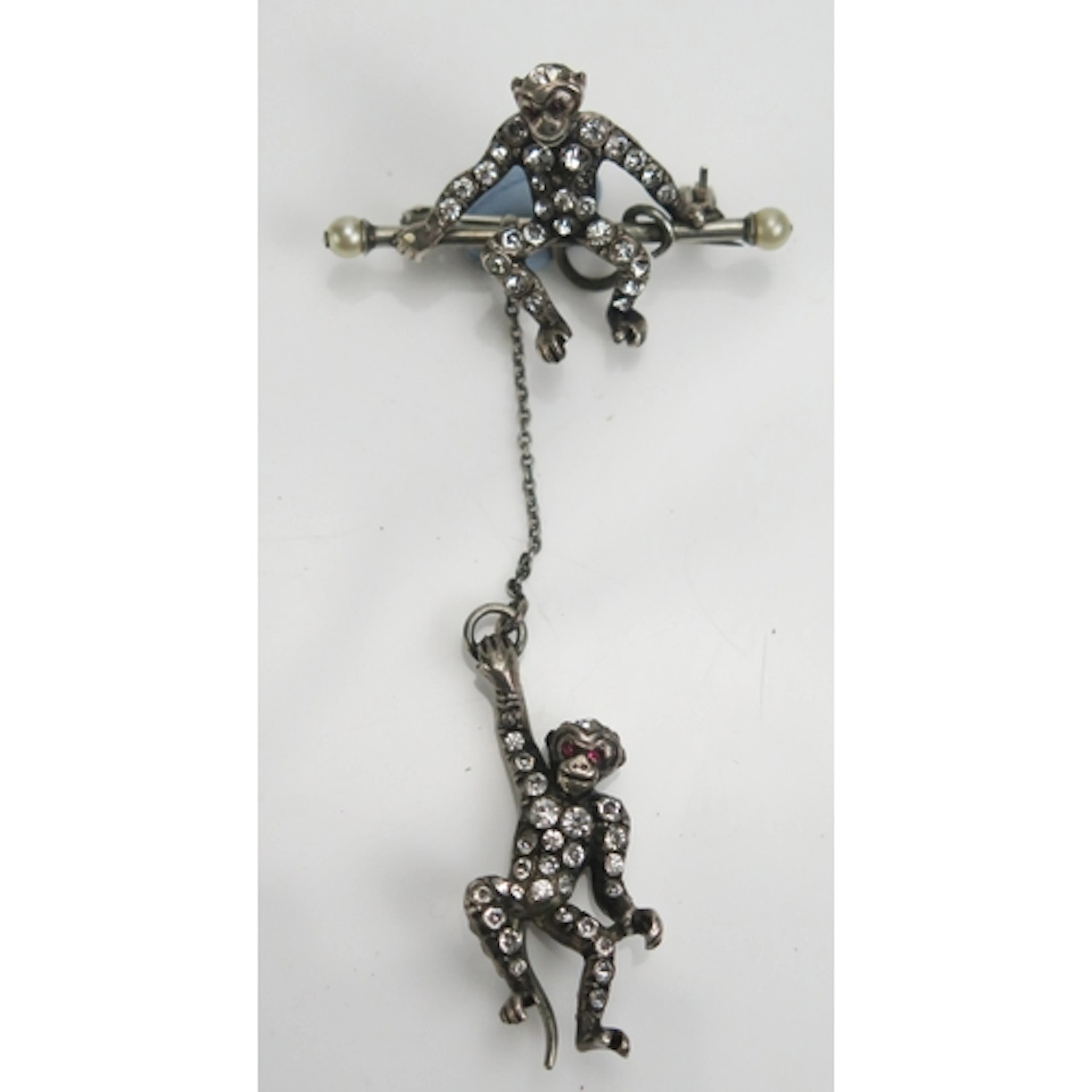 A Knoll & Pregizer .935 silver and paste monkey brooch, 8.37...