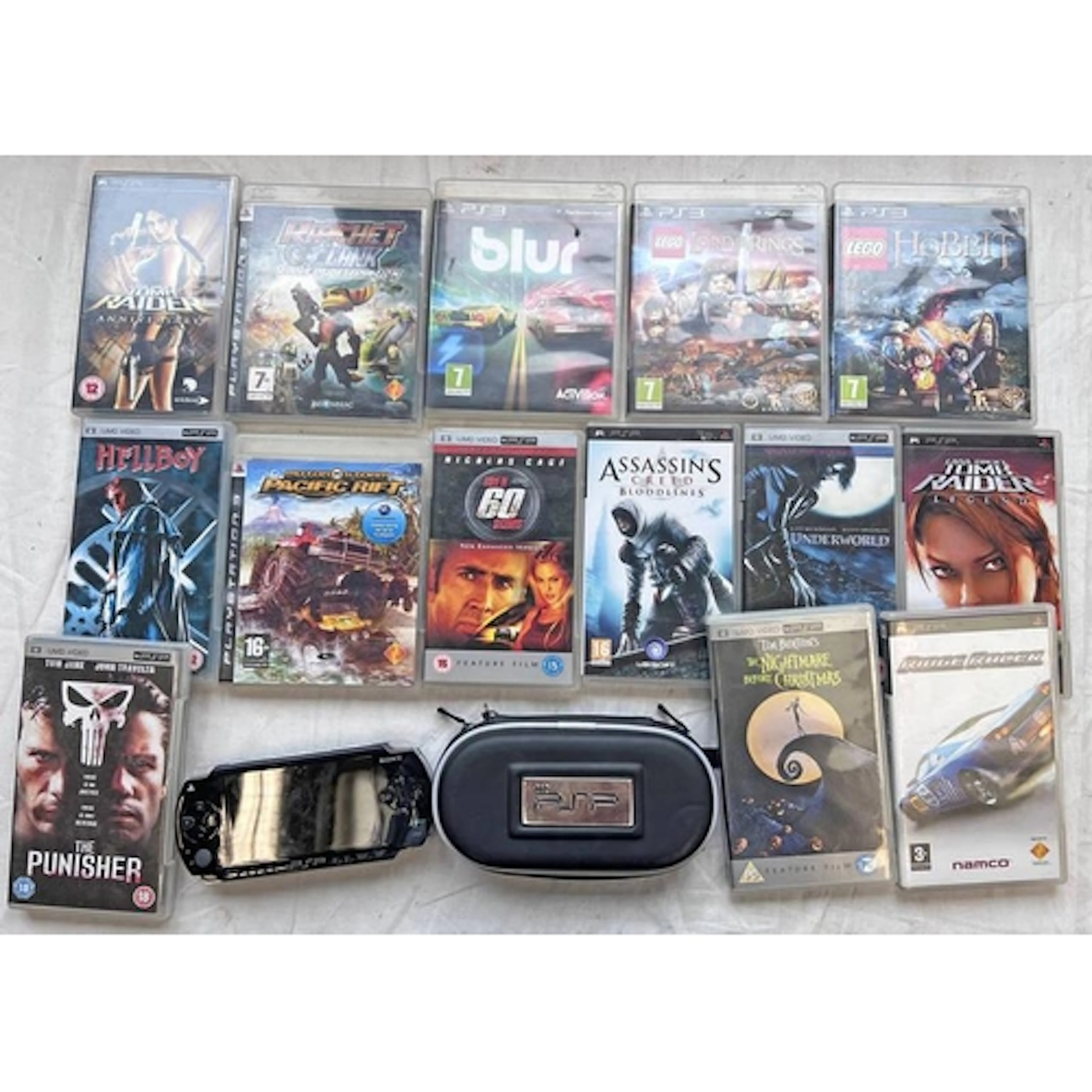 SONY PSP TOGETHER WITH A SELECTION OF GAMES, UMD VIDEOS & PS...