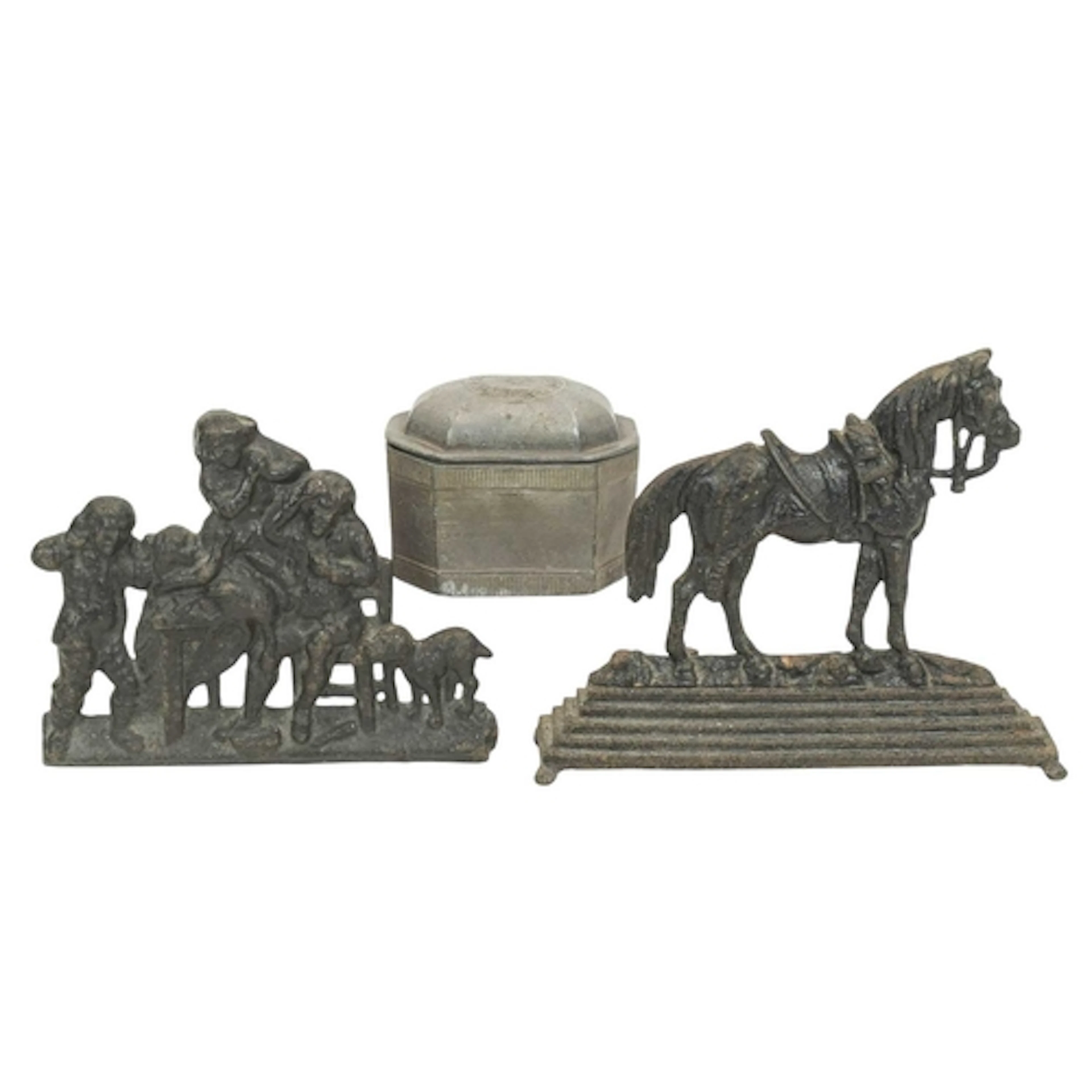A lead sarcophagus shaped lidded tobacco box. Early 19th cen...