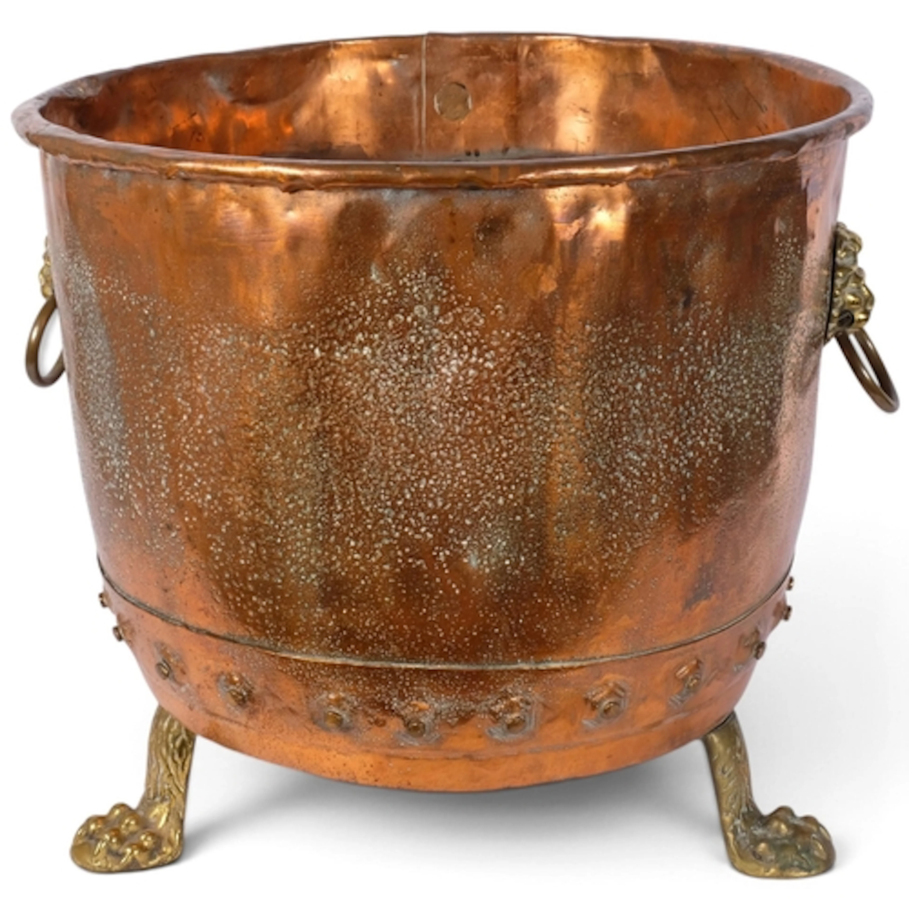 A large riveted copper log bin, with brass lion ring handles...