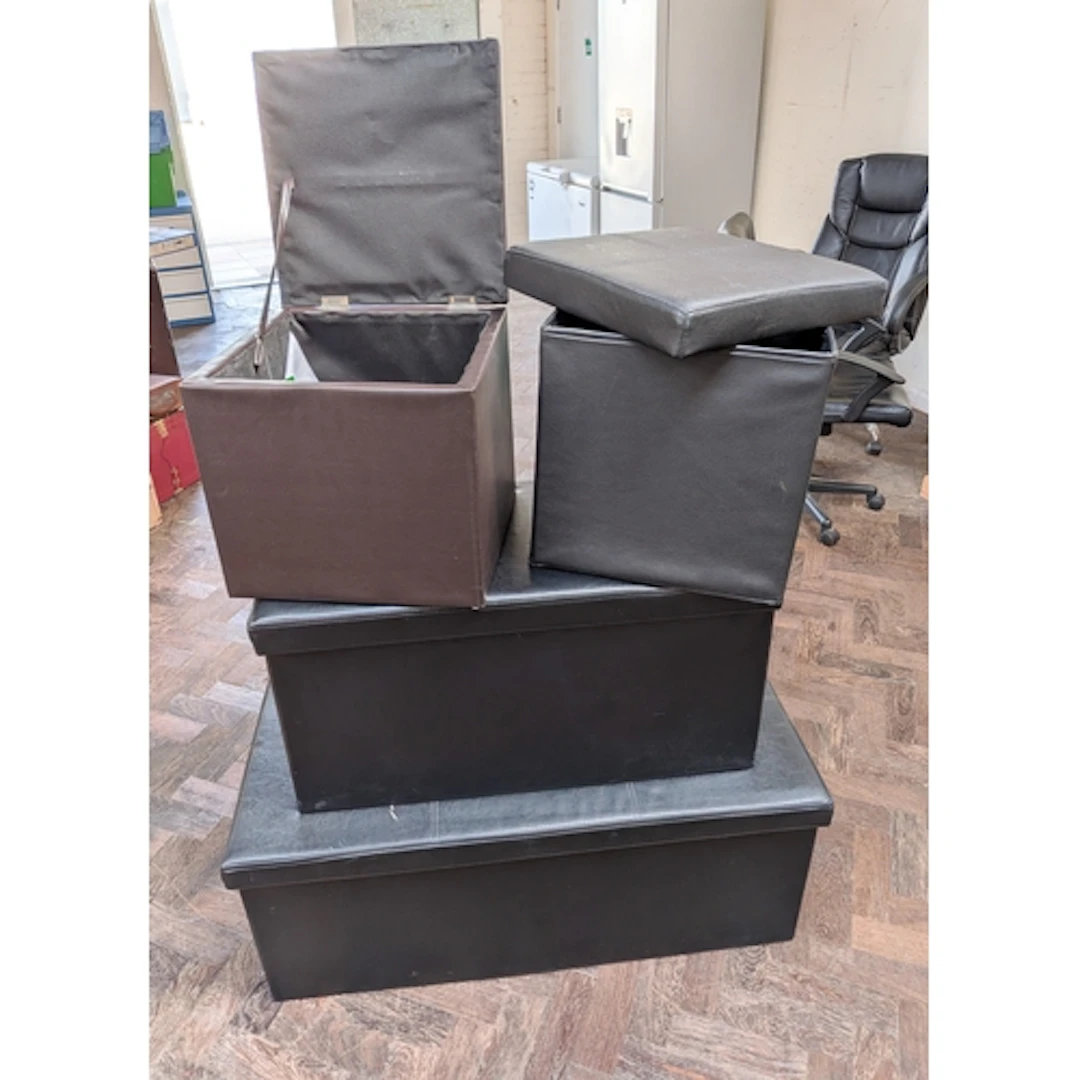 Four faux leather storage ottomans and two small bathroom wh...