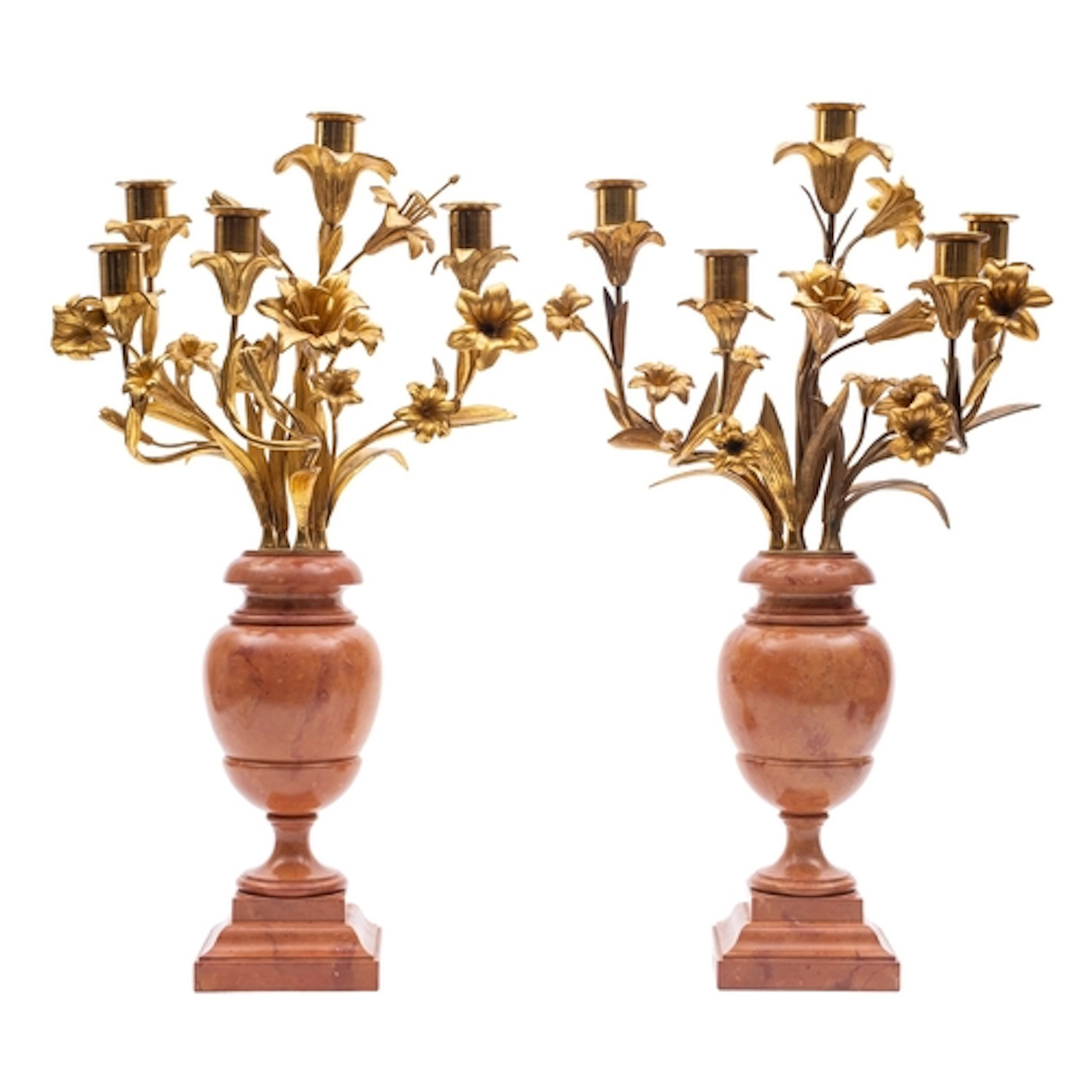 A pair of gilt metal mounted faux marble five-light candelab...