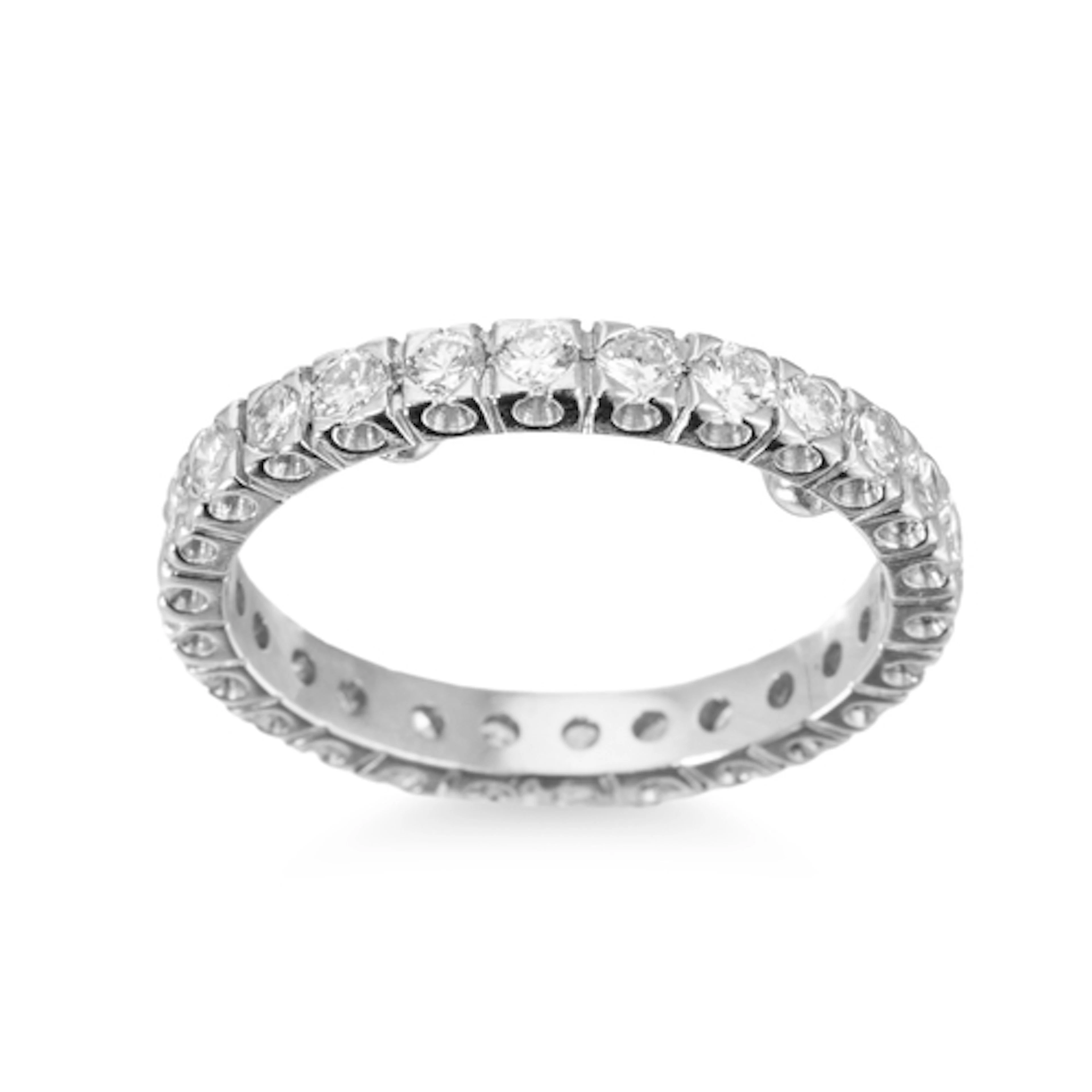 A DIAMOND FULL BANDED ETERNITY RING, mounted in 18ct white g...