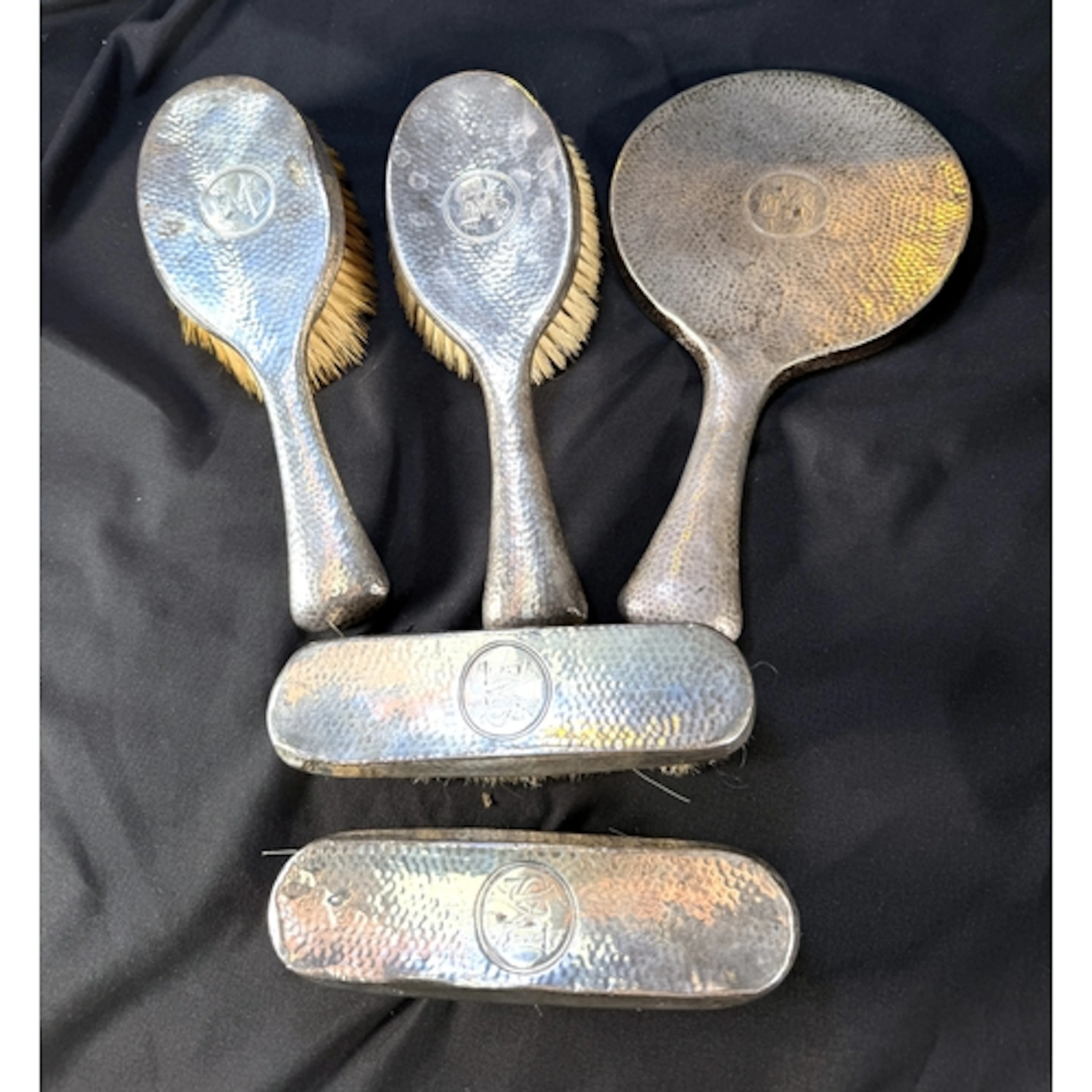 A heavy hall marked silver monogrammed and planished four pi...