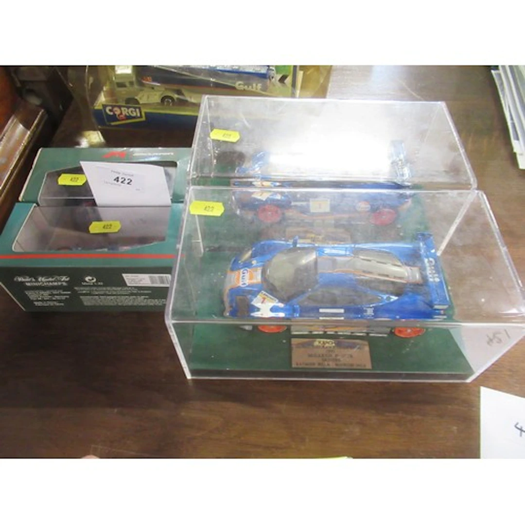 Two Paul Model Art Champs models of Mclarens together with t...