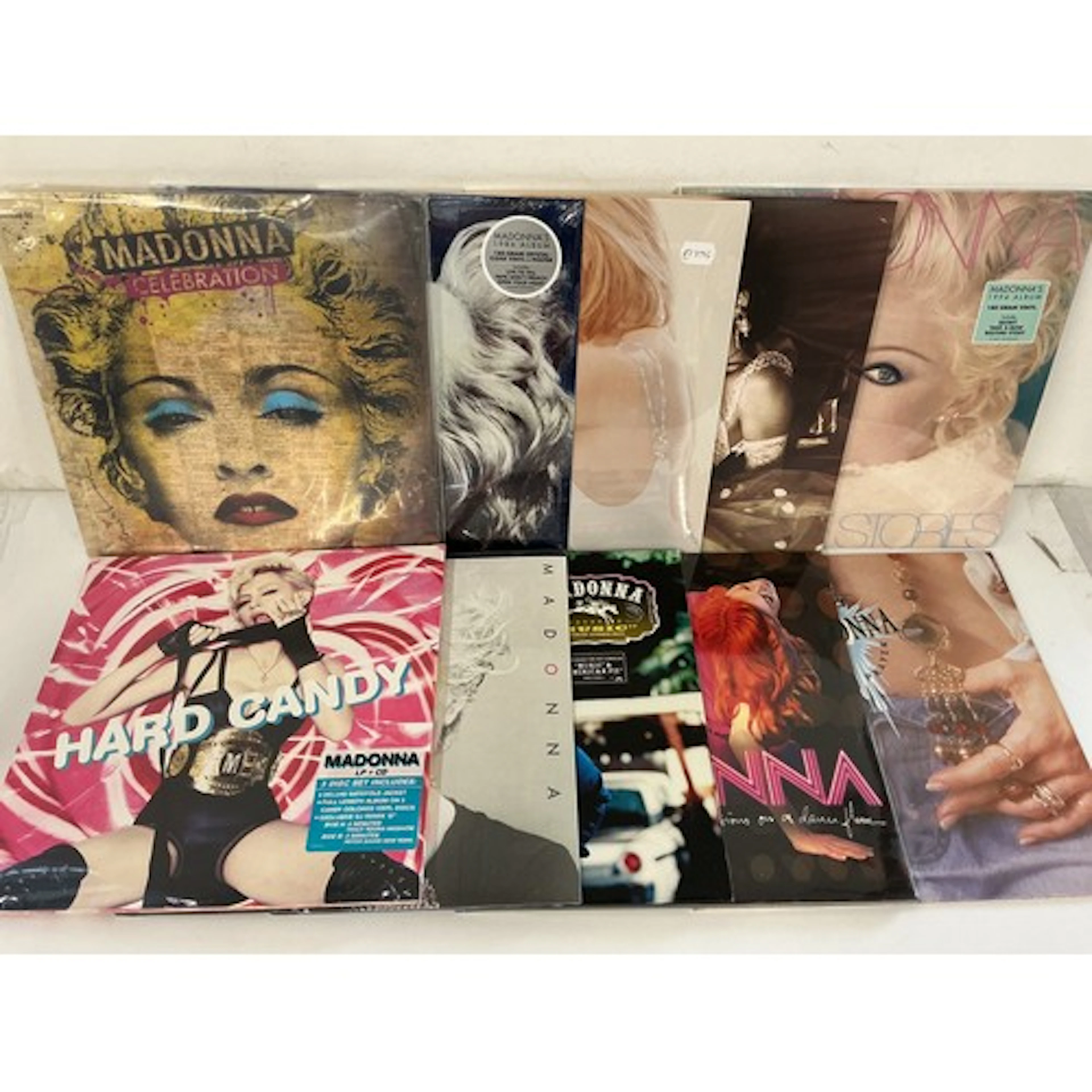 Two bags containing ten Madonna LPs comprising mainly sealed...