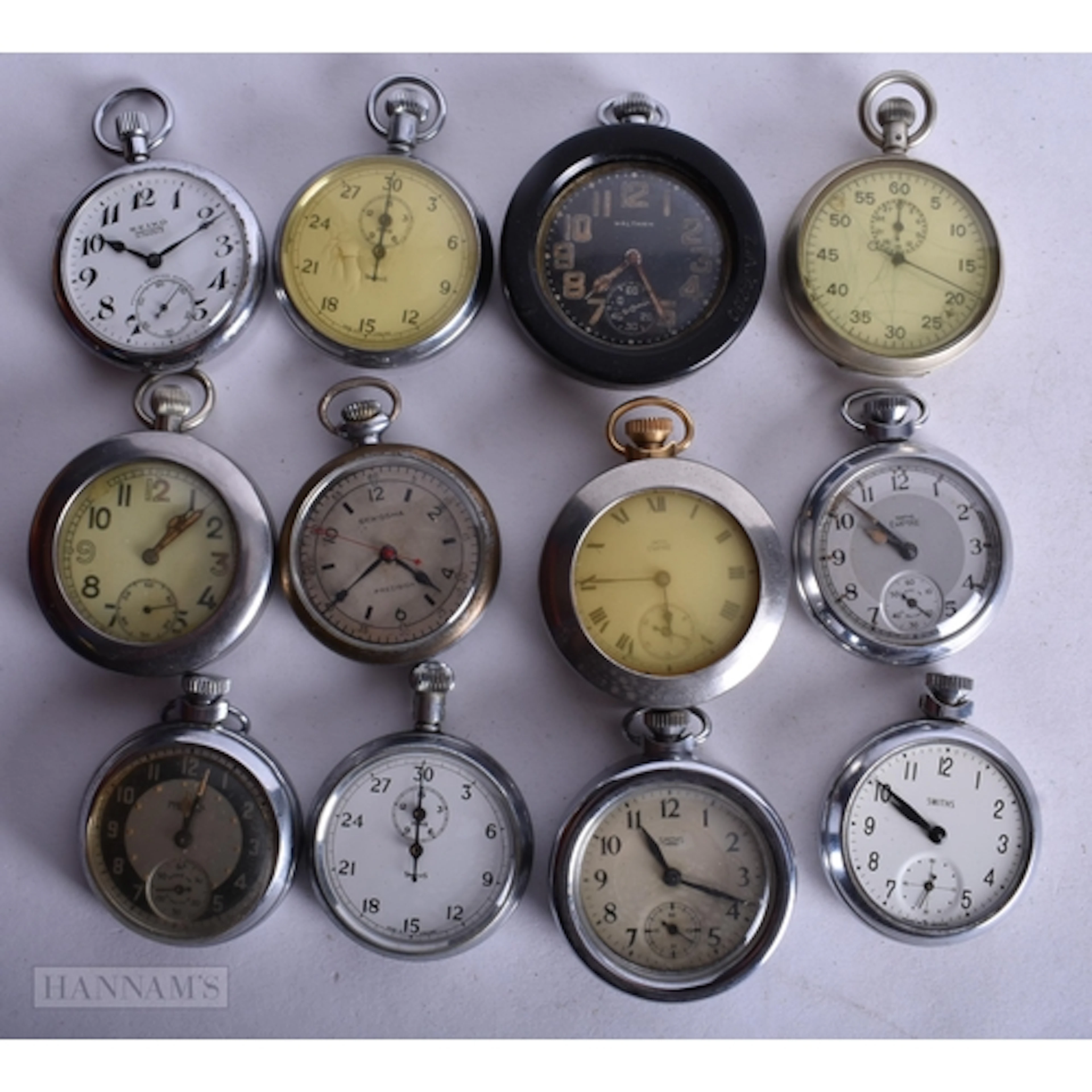 A MILITARY WALTHAM POCKET WATCH together with others. Untest...