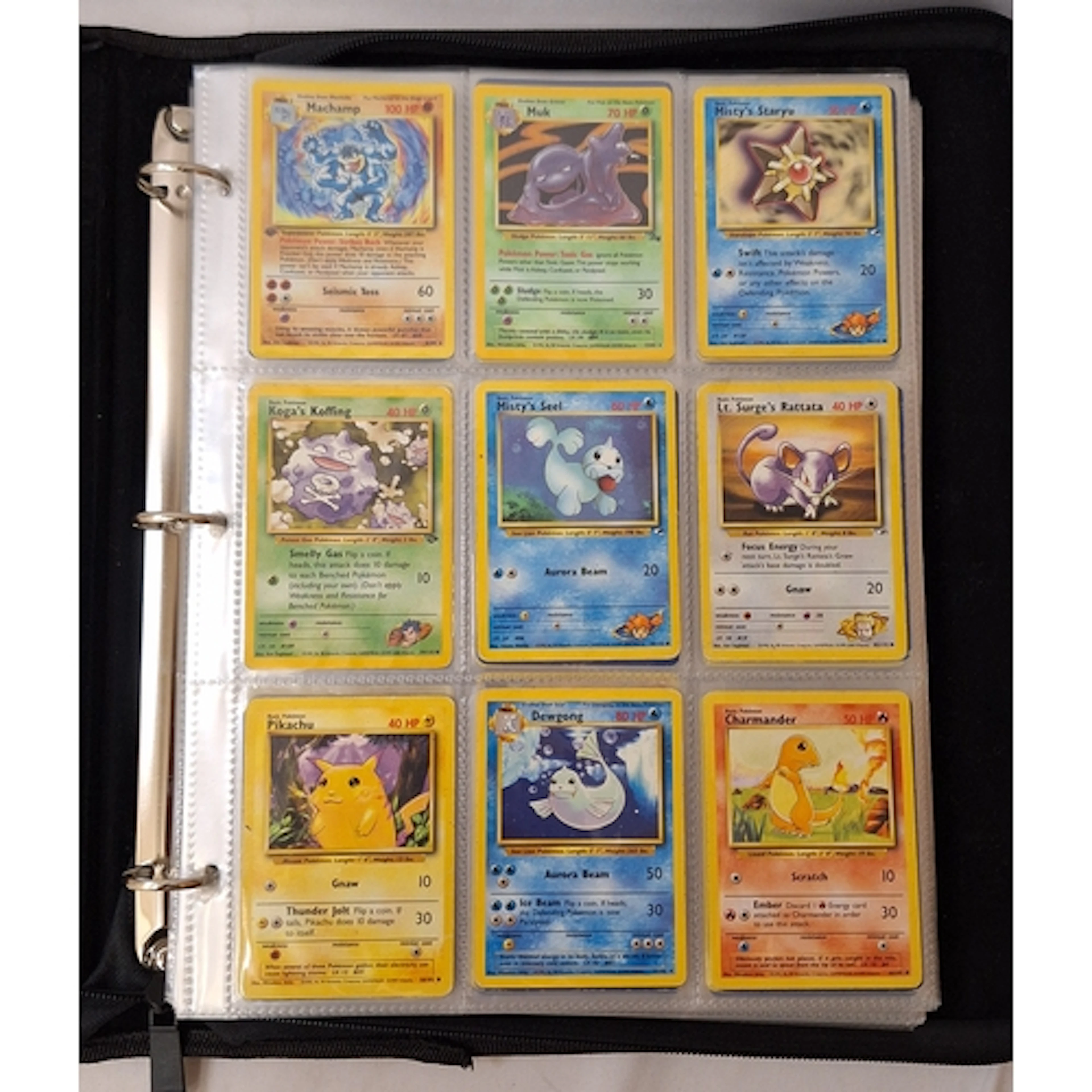 Pokemon Cards in official folder incl. 1st edition Machamp, ...