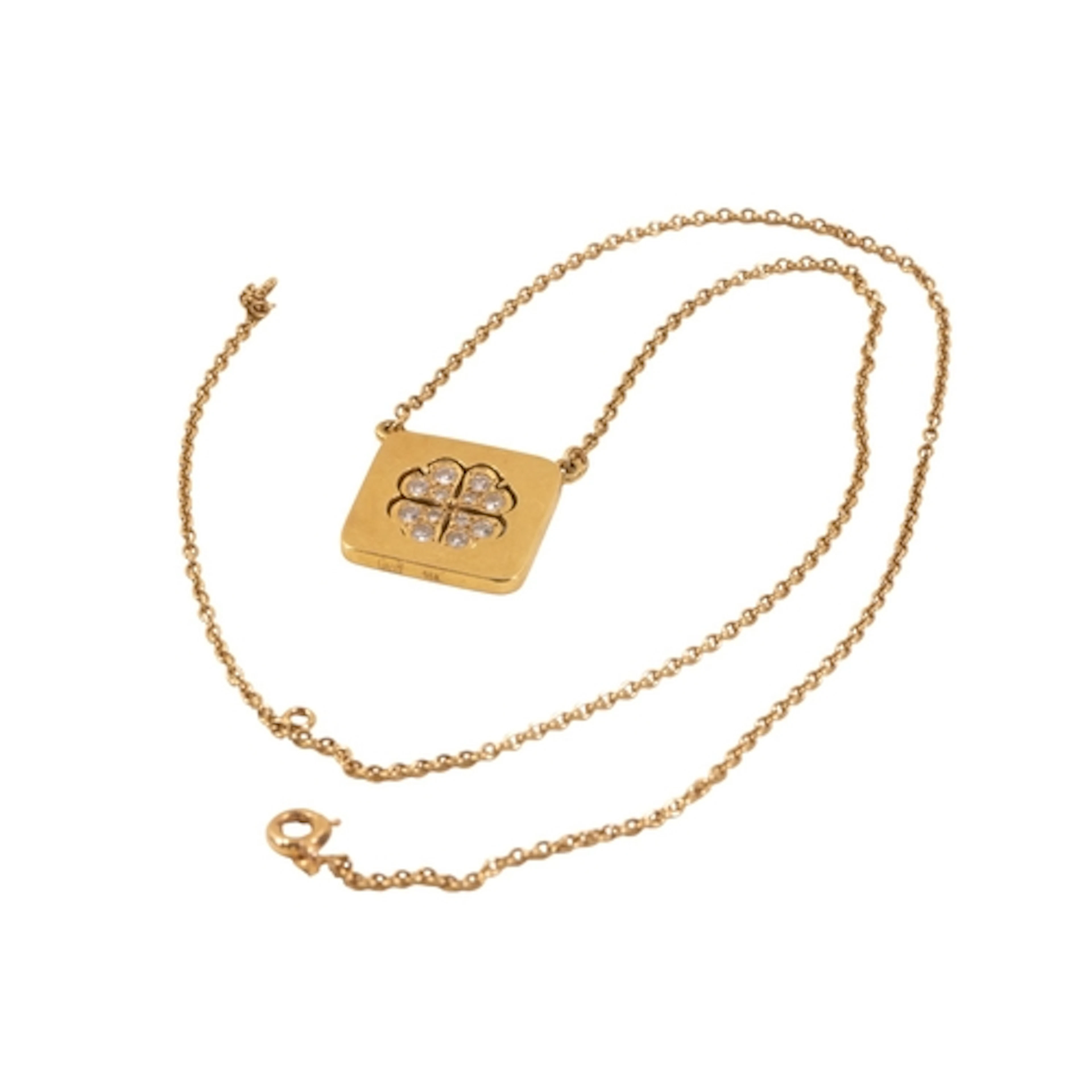 Attributed to Graff. A yellow metal pendant of square form w...