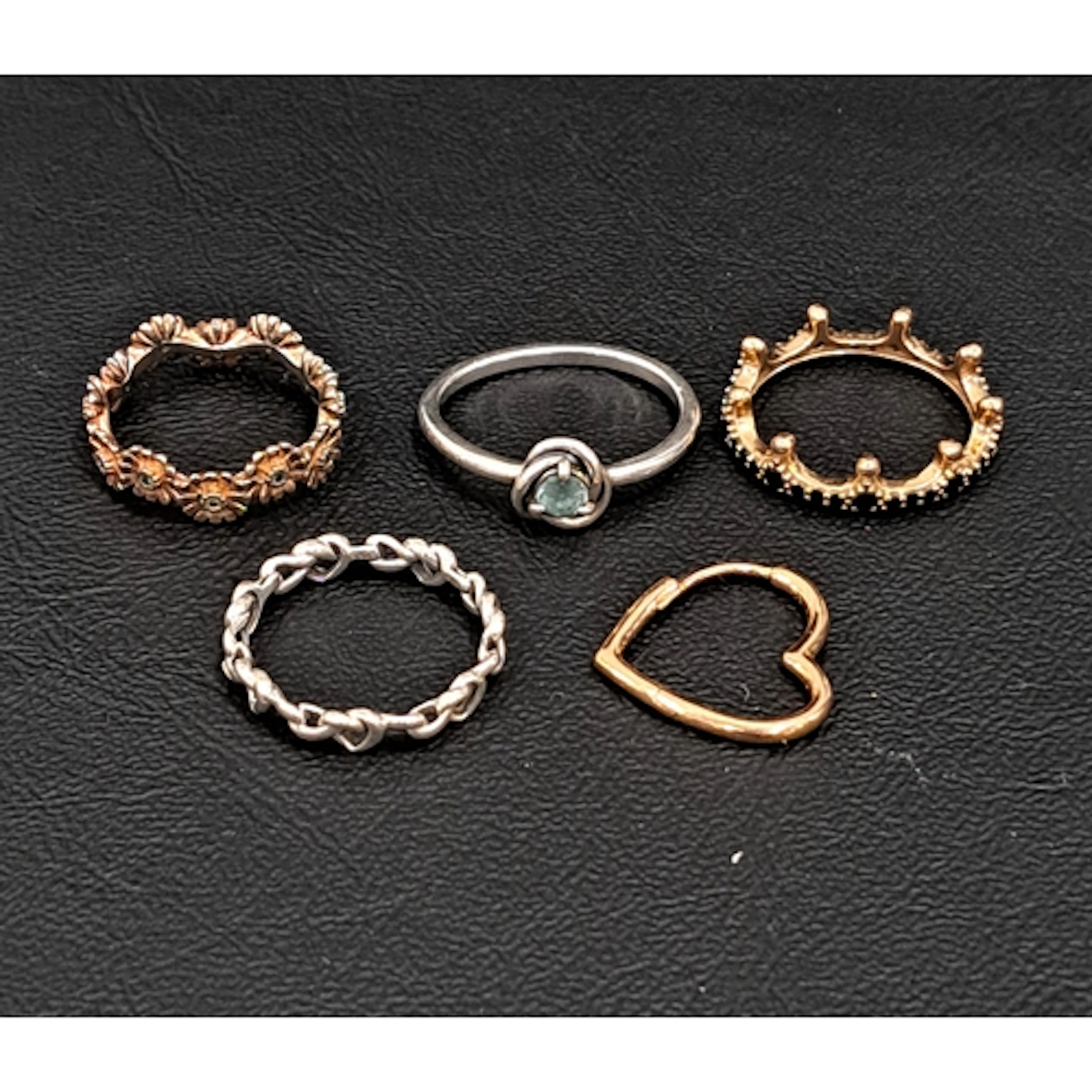FOUR PANDORA RINGS comprising a March birthstone eternity ci...