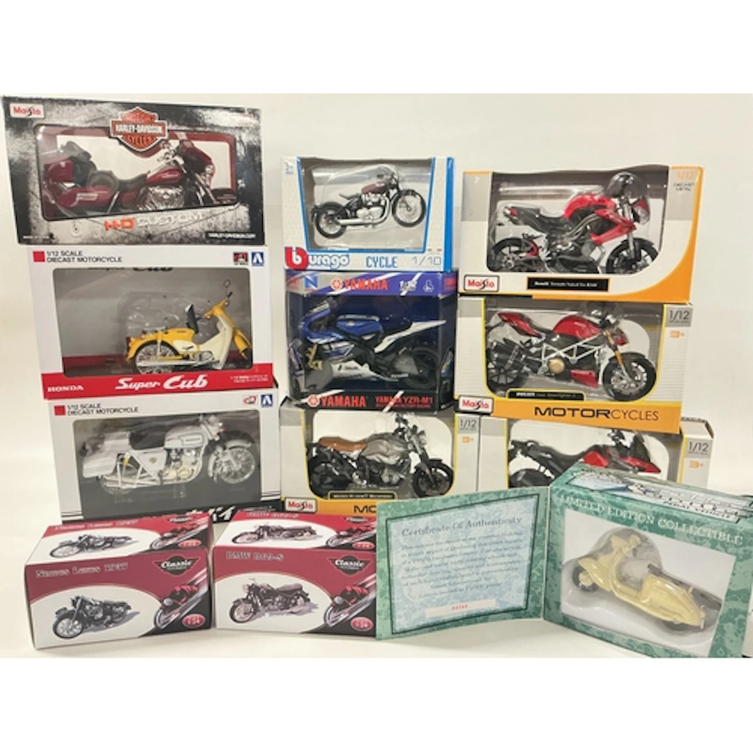 A Collection Of Boxed Diecast Motorcycles, Including Maisto,...