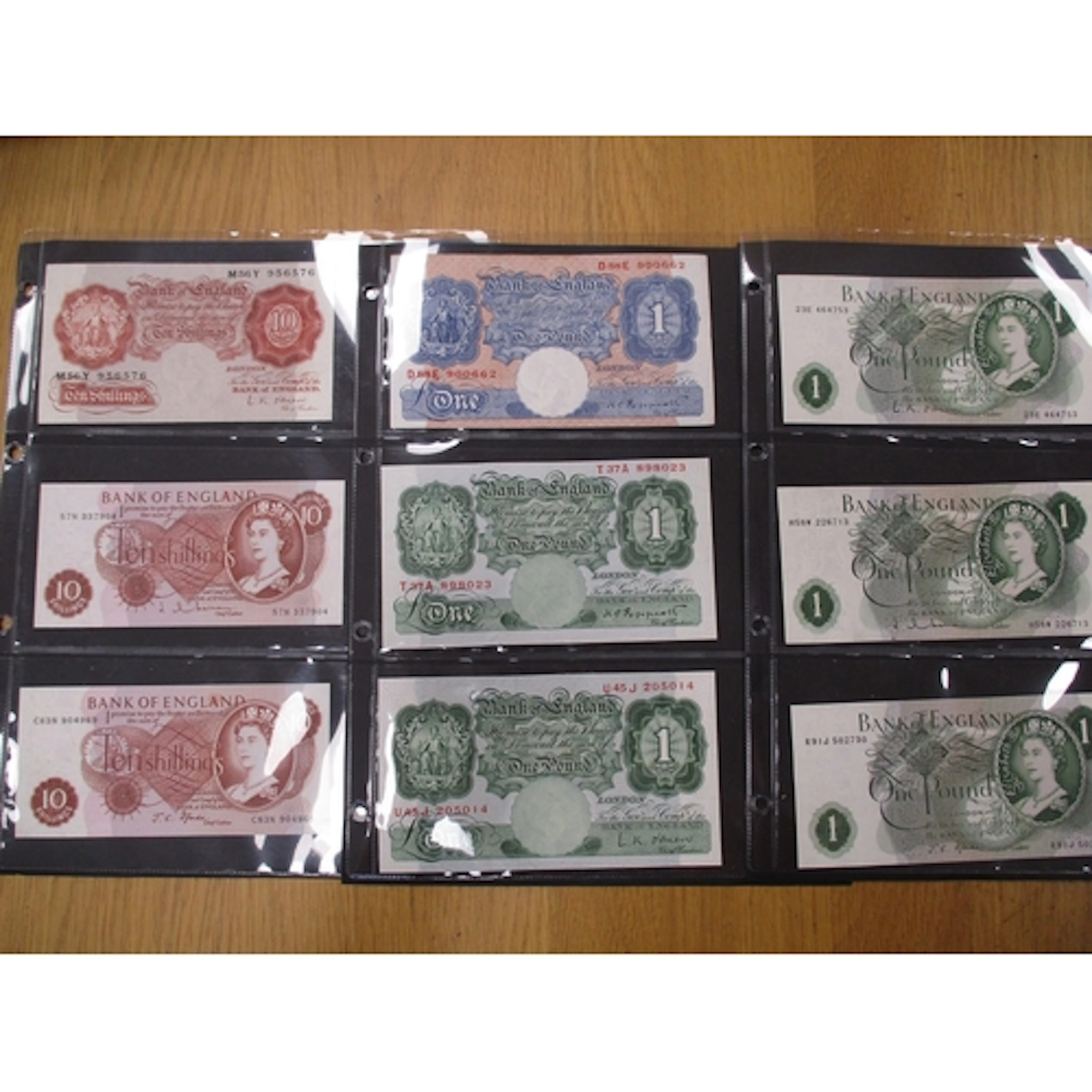 Collection of £10, £5, £1 and 10/- in plastic sleeves, gener...