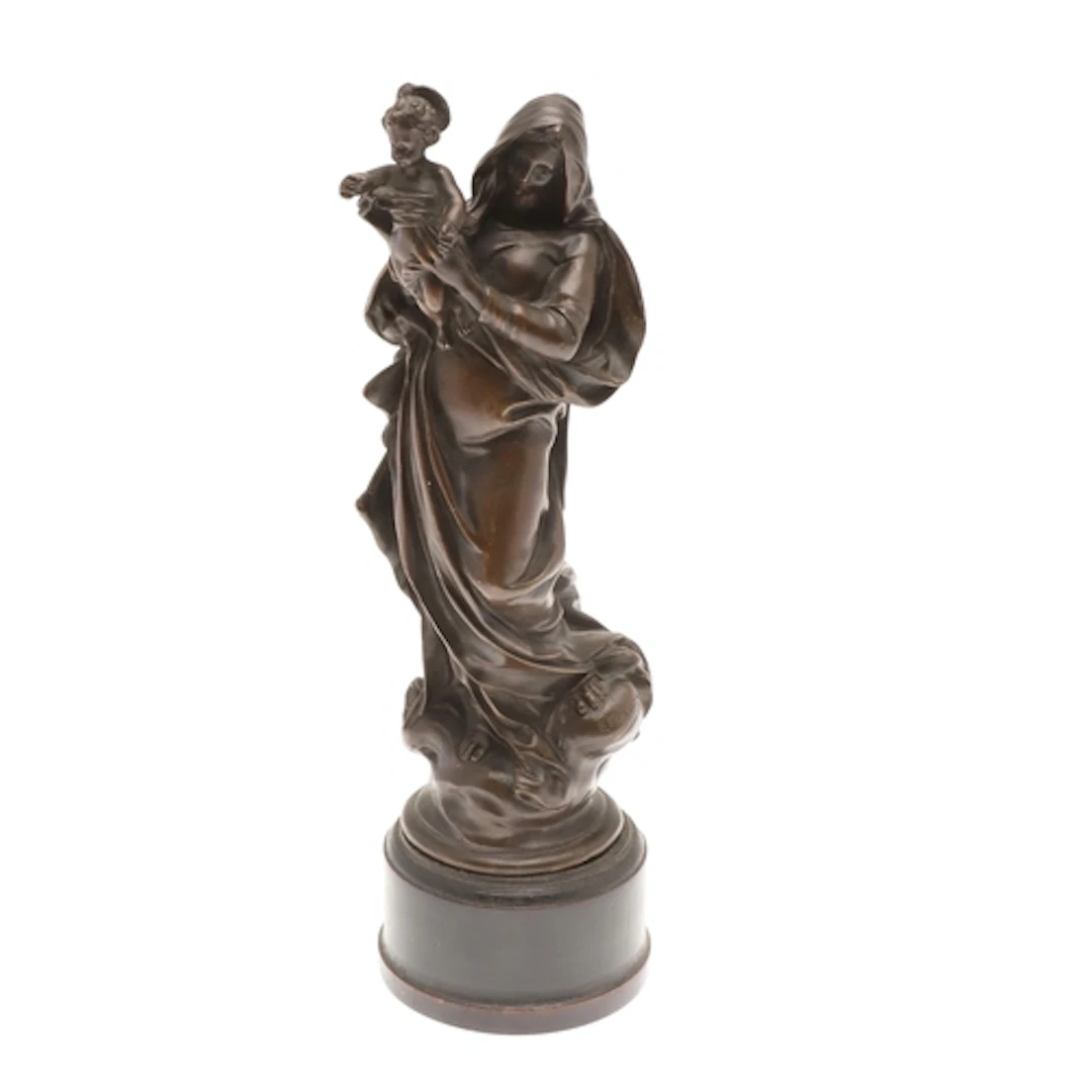 A 19TH CENTURY FRENCH BRONZE OF THE MADONNA AND CHILD. the M...