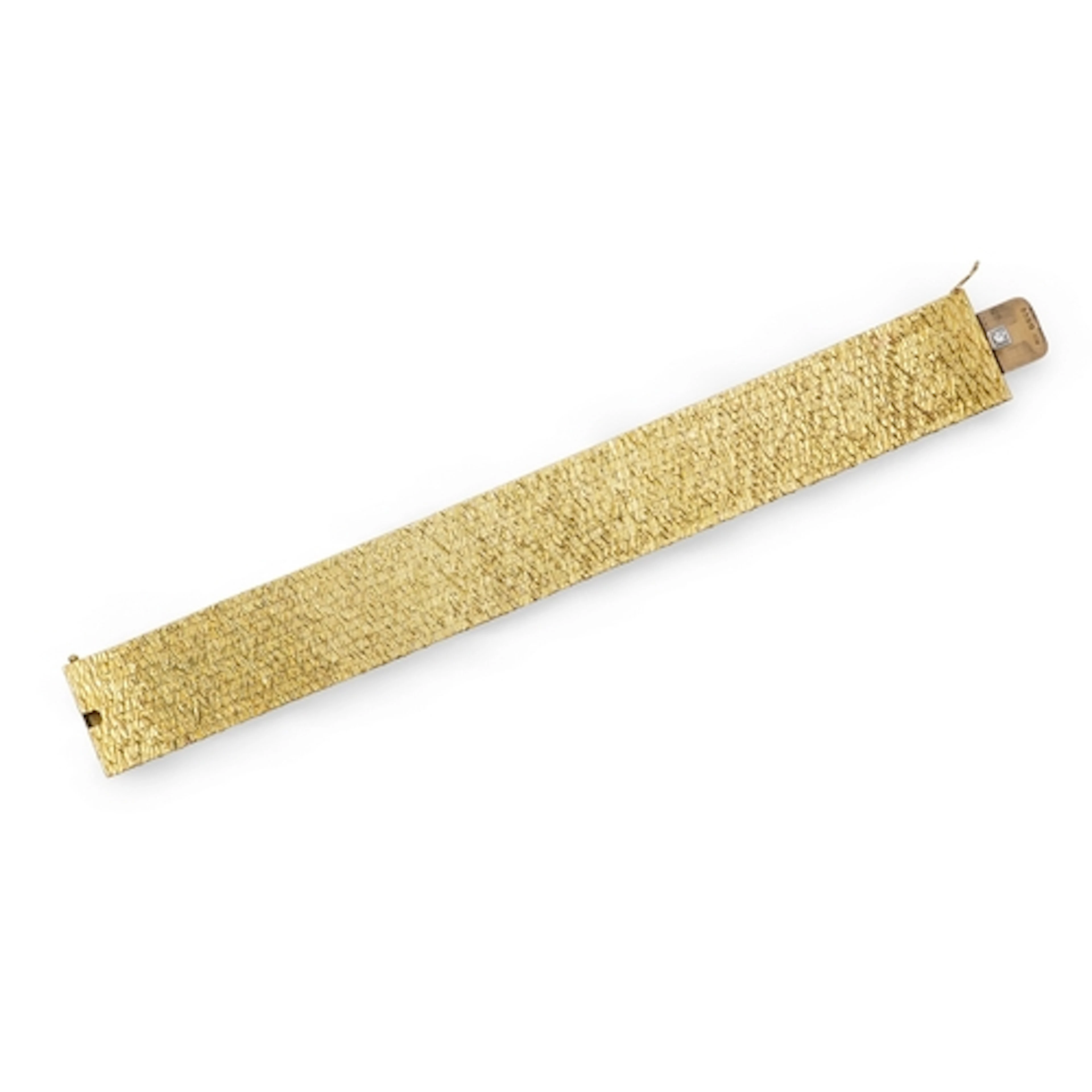 An 18ct gold and diamond bracelet, circa 1961, designed as a...