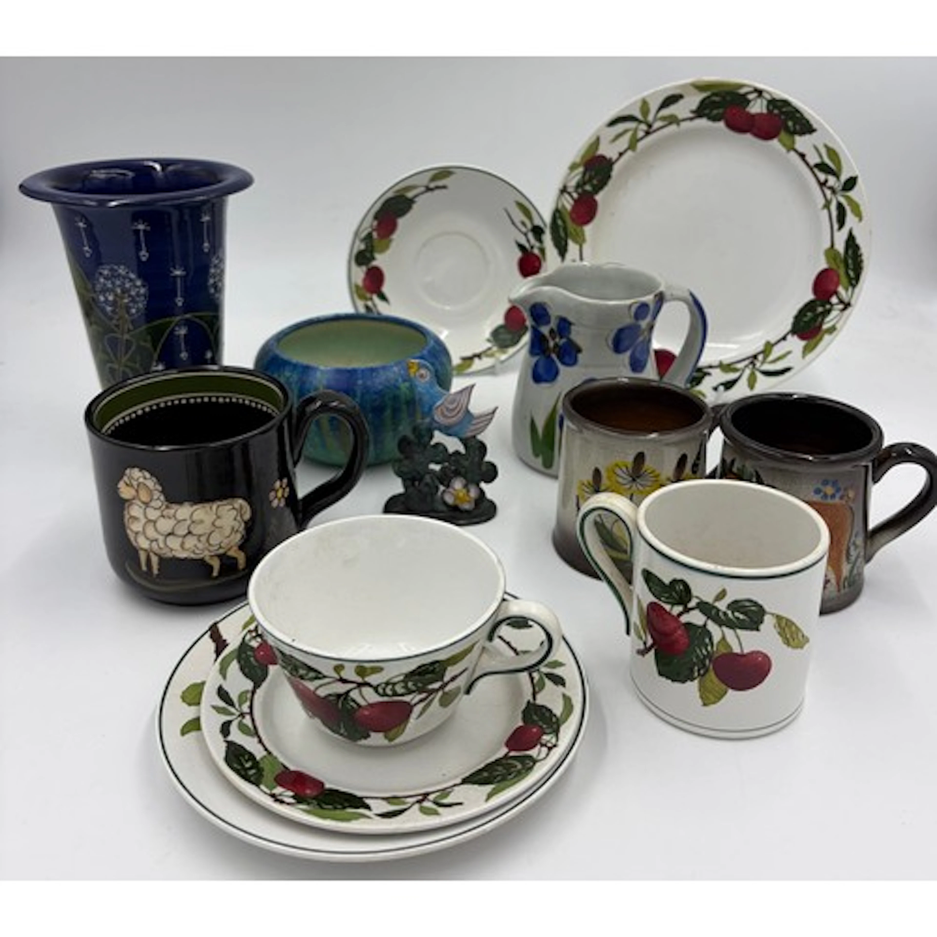 A collection of studio pottery to include Brett B Drip Vase,...