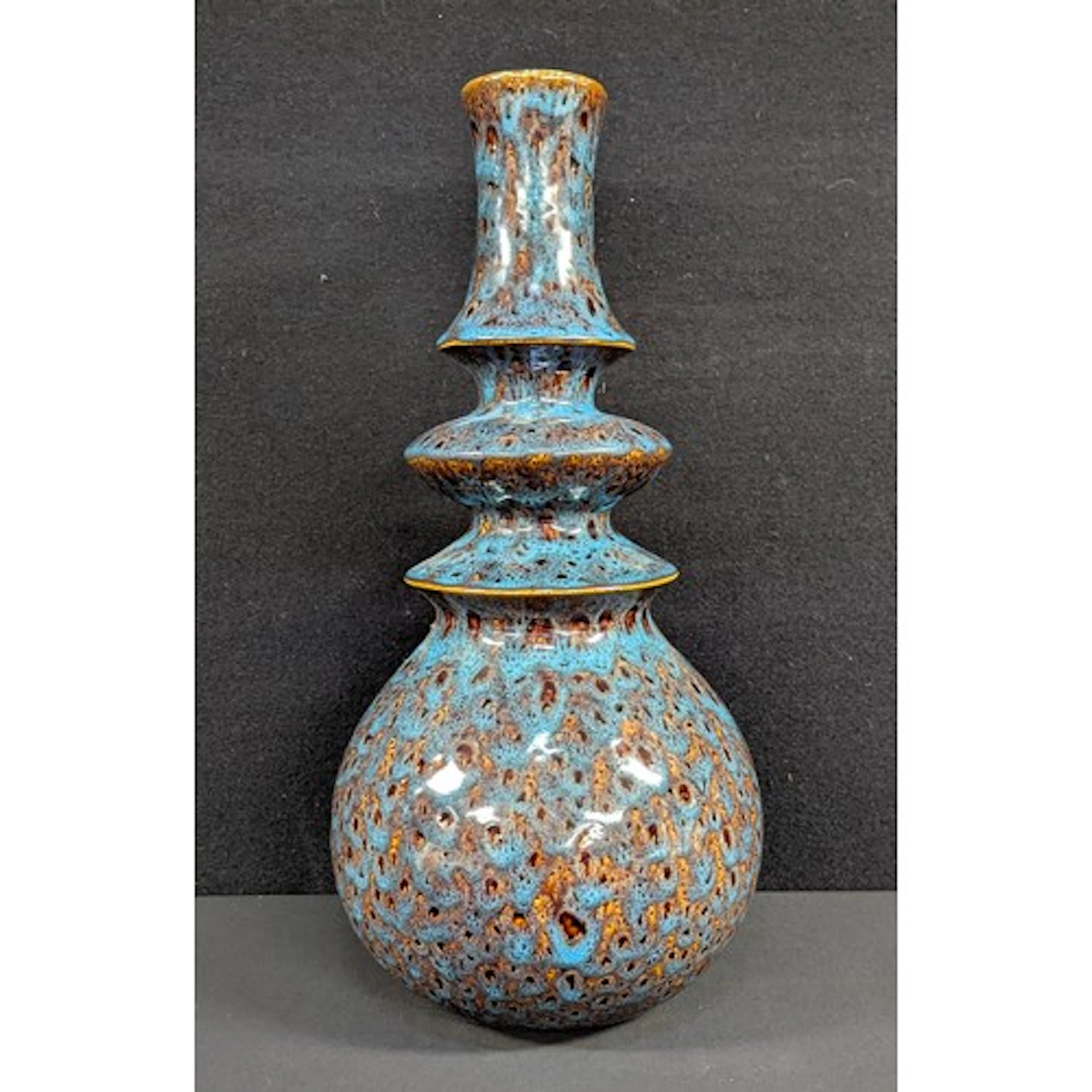 A large Continental mid 20th century baluster vase, with tri...