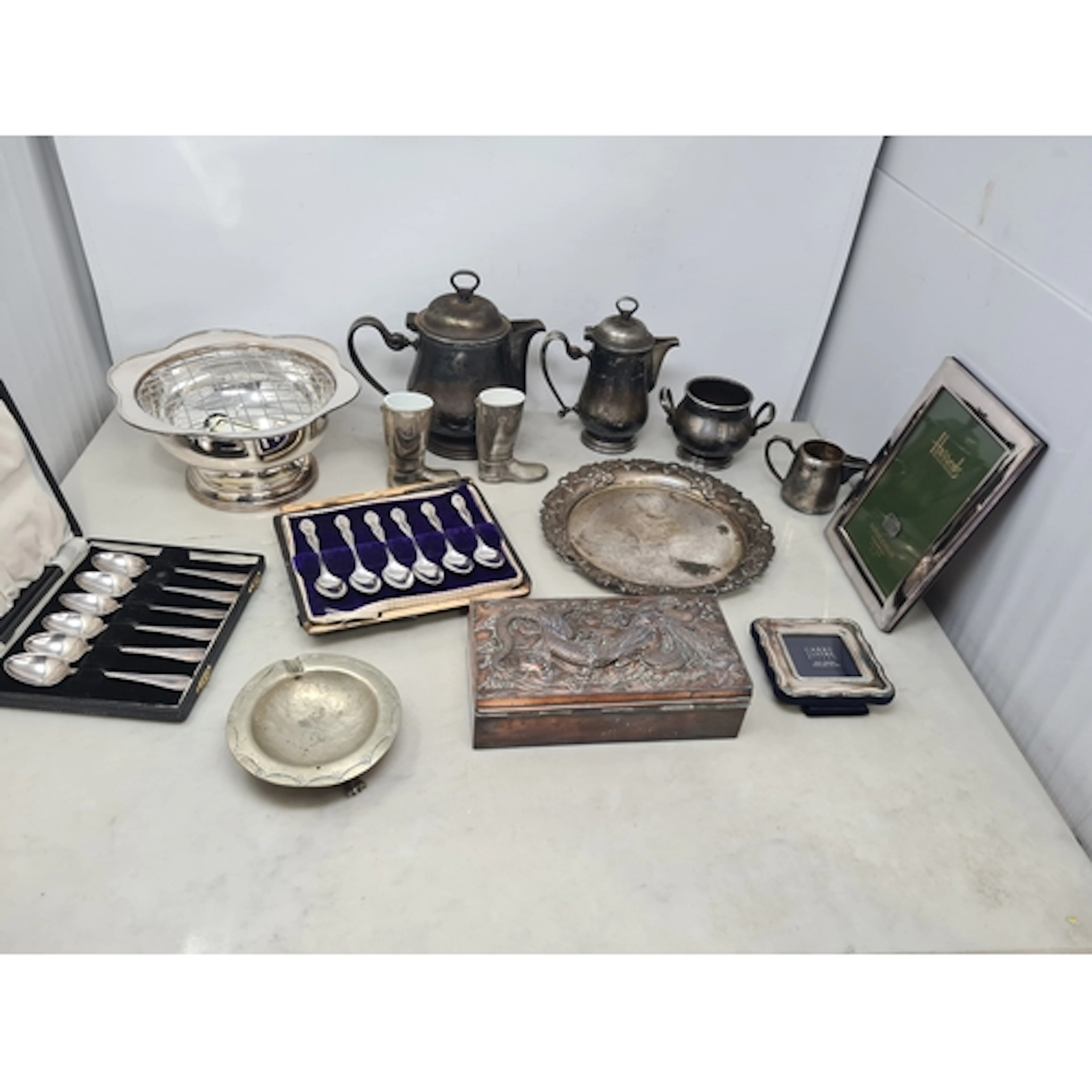 A modern silver small square Photograph Frame, a plated Fram...