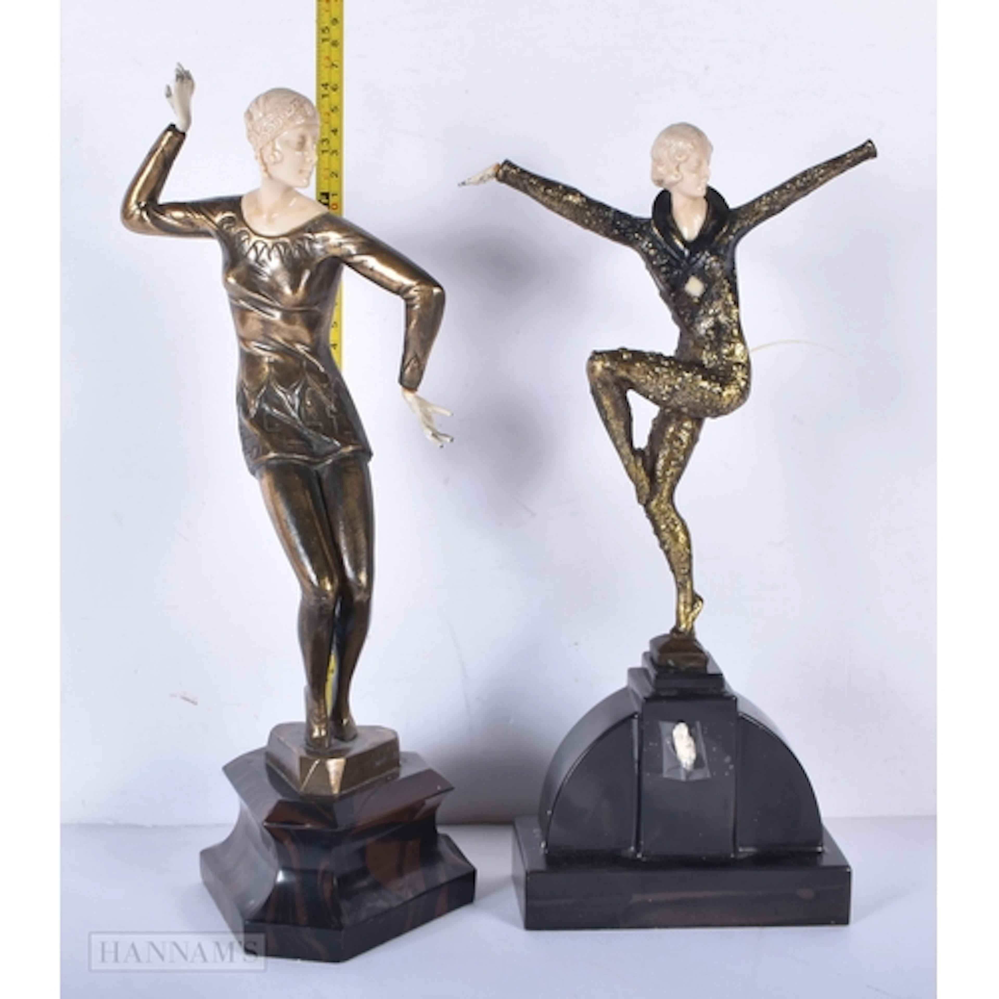 A pair of vintage Art Deco style bronzed metal dancing lad...