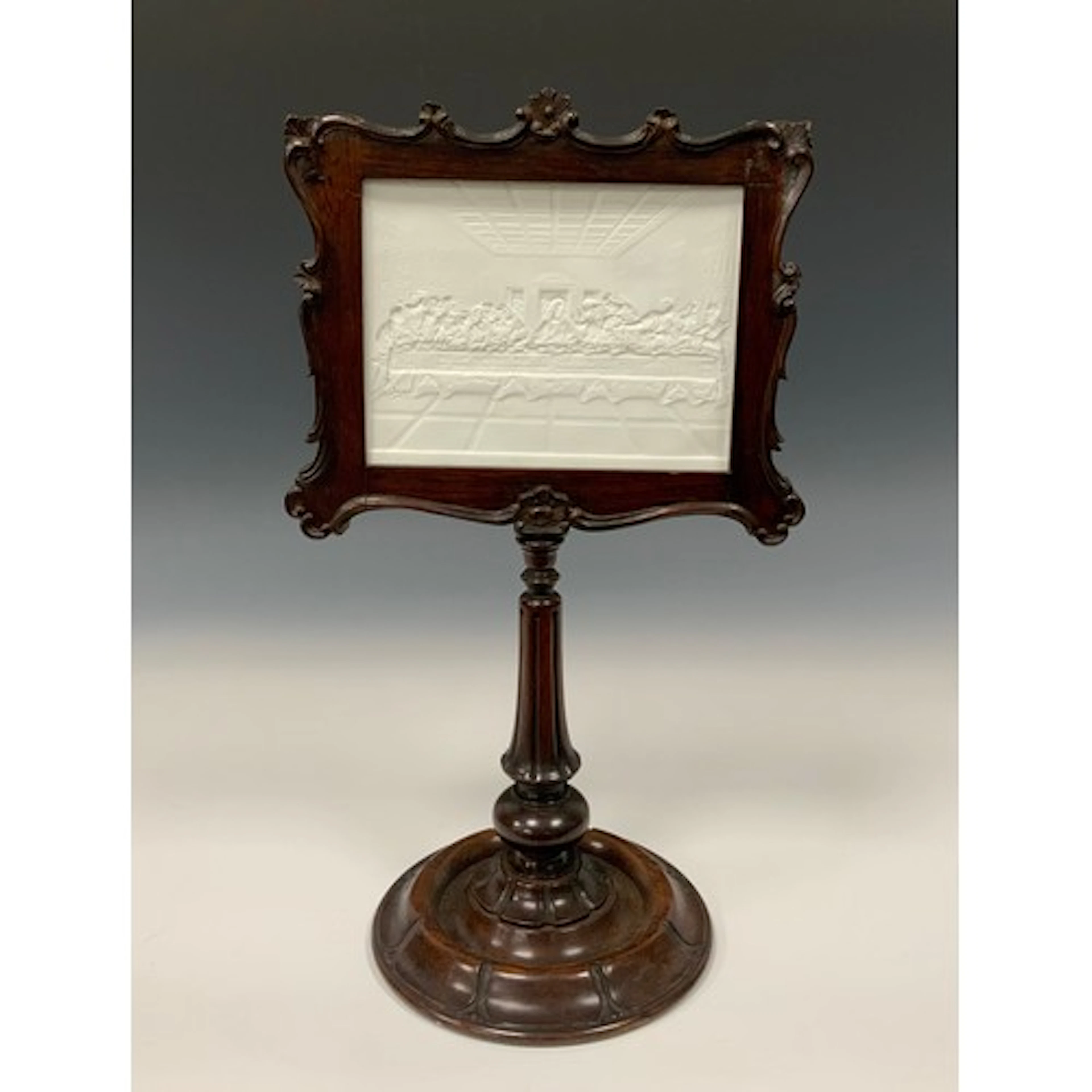 A William IV rosewood table top lithophane viewer, the shape...