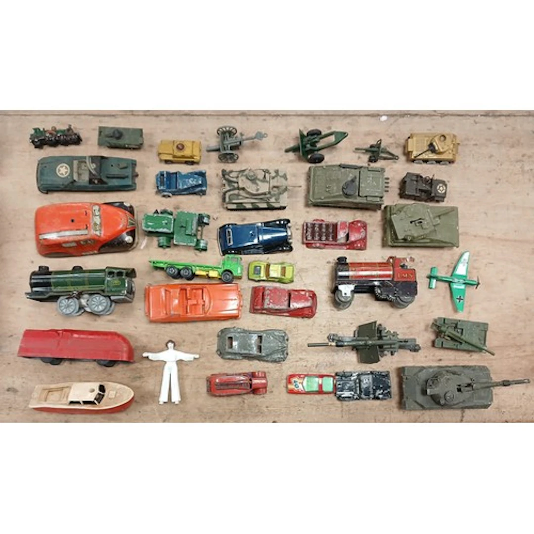 Collection of tine plate and other well worn toys to include...