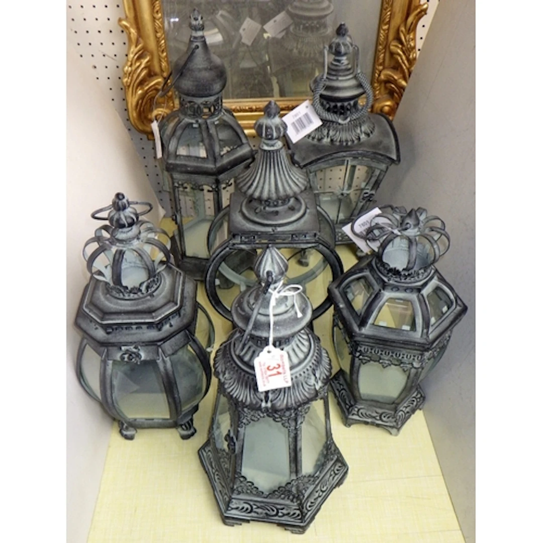 A group of six various candle lanterns (6)