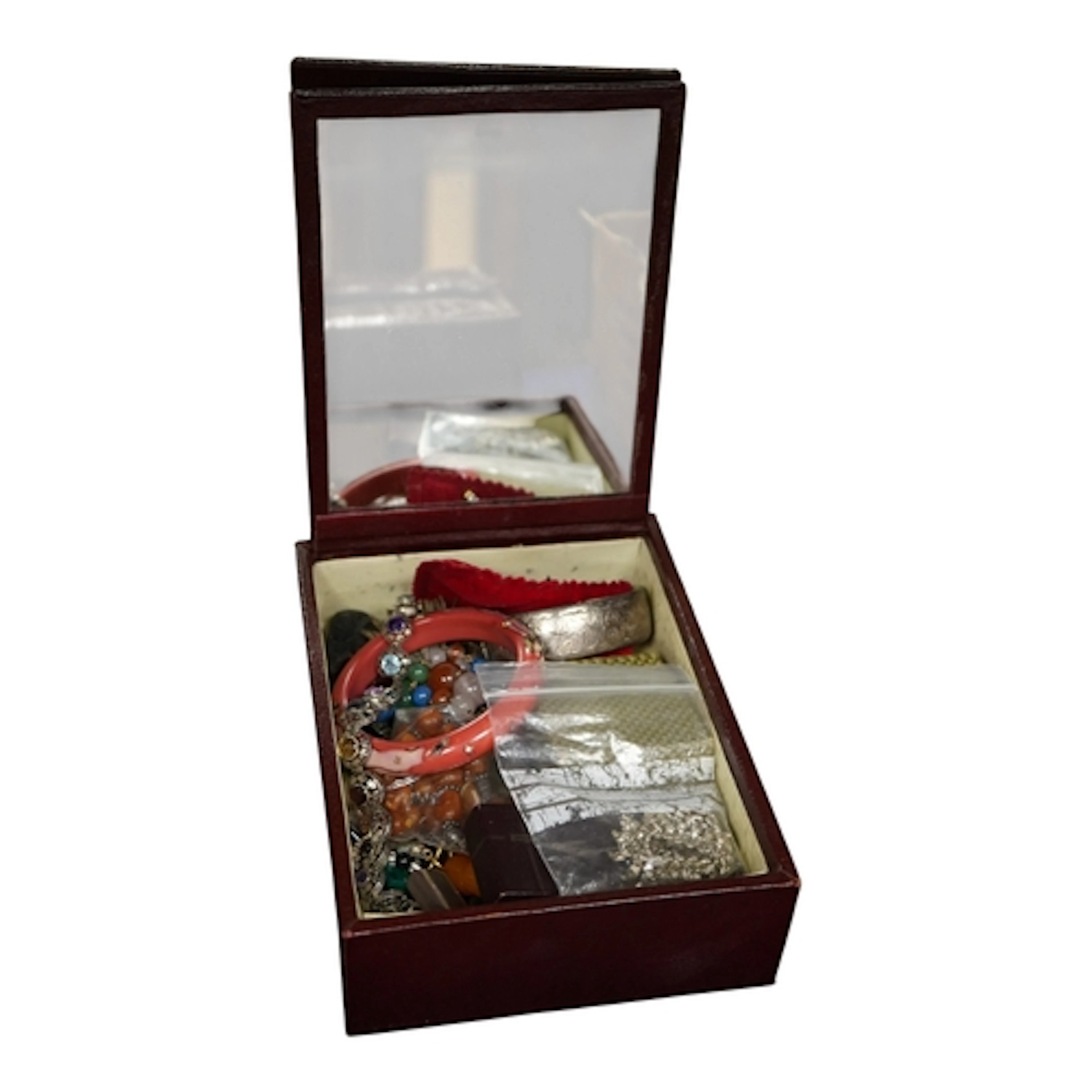 A box of jewels including a gem-set bracelet, the bracelet s...