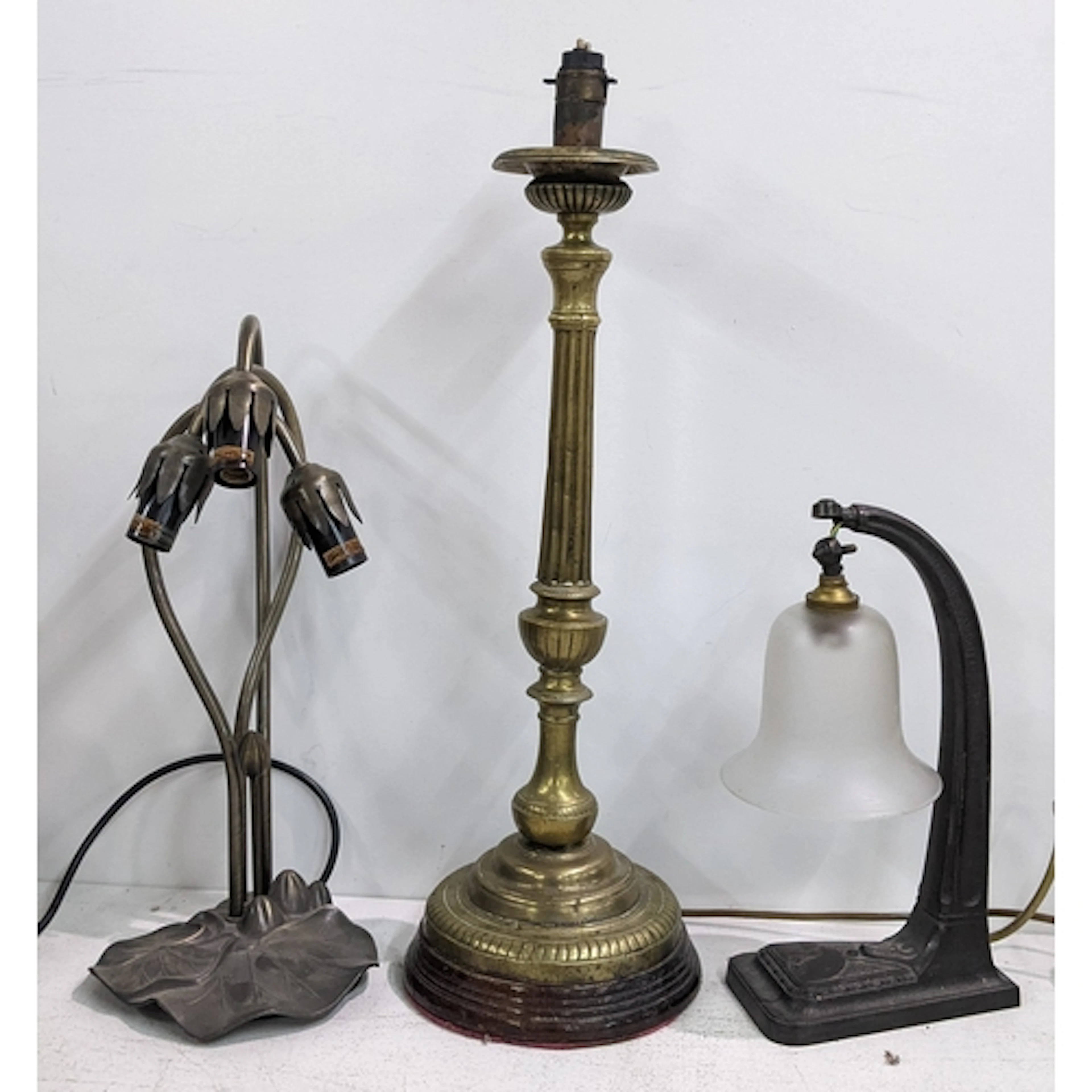 Three table lamps to include an early 20th century brass lam...