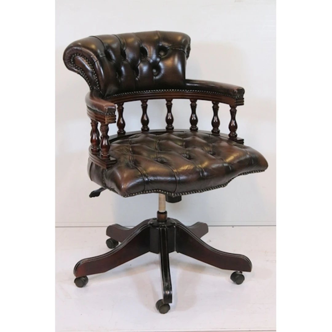 20th century button back captain's swivel armchair, having t...