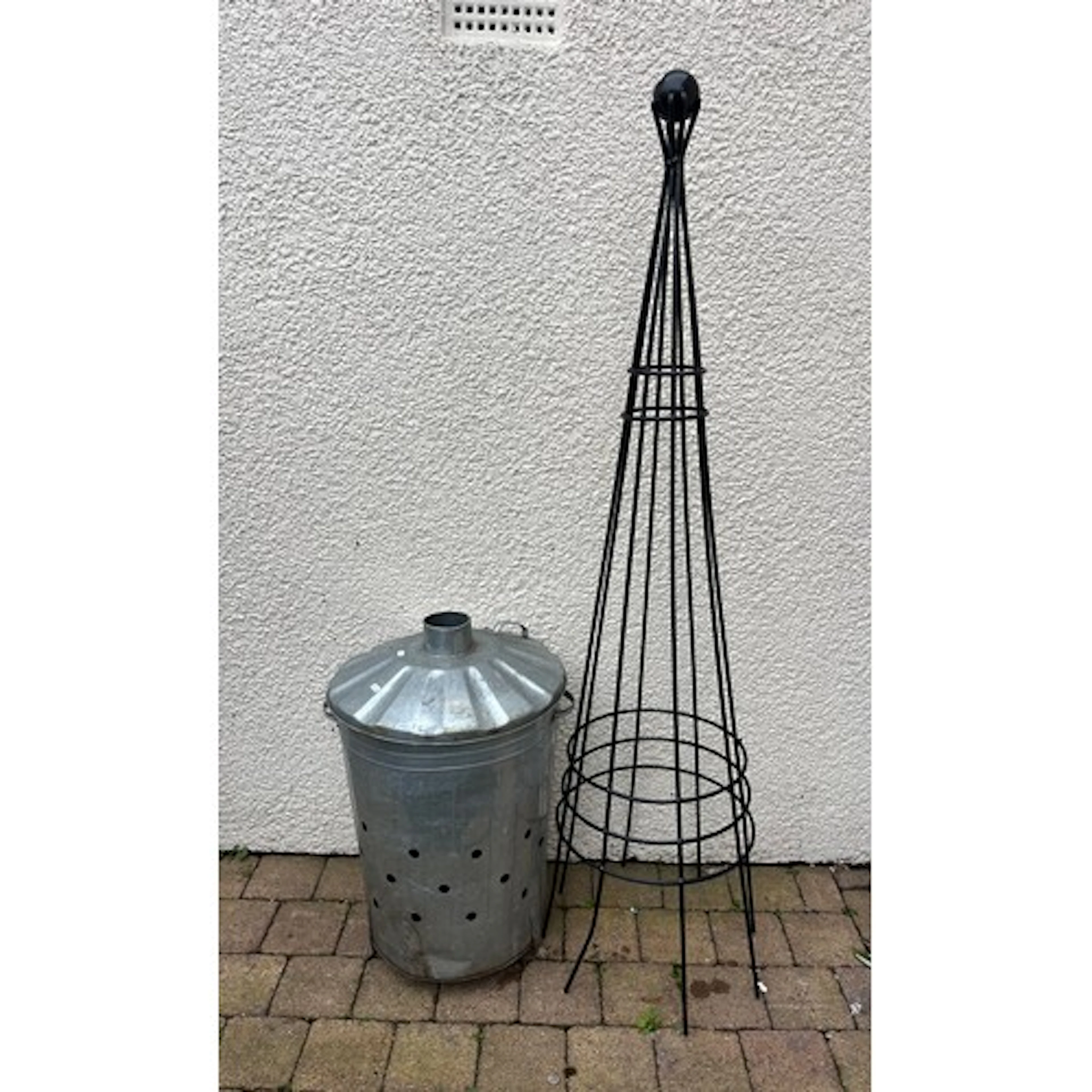 Garden metal incinerator and garden trellis.