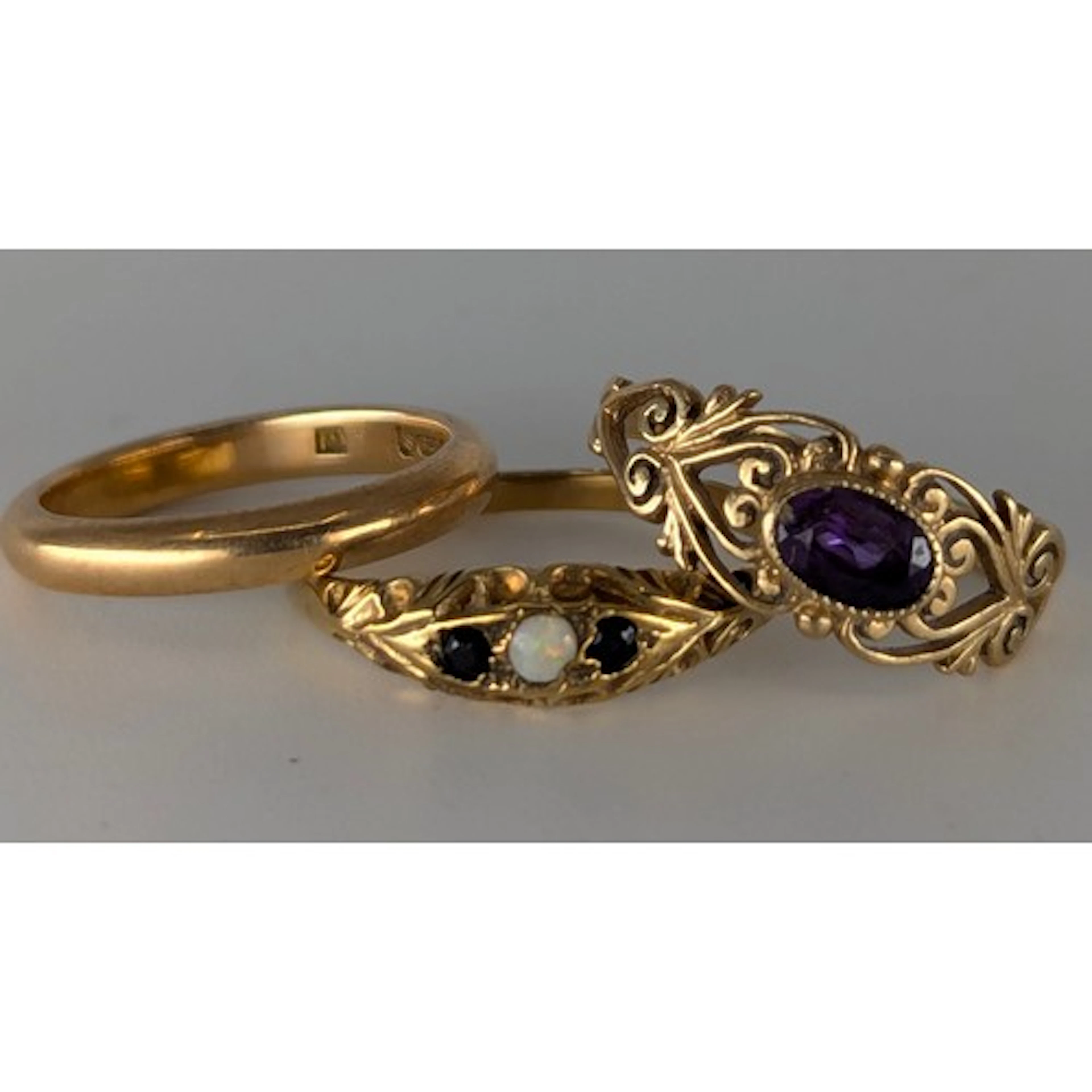 Rings - a 9ct gold wedding band, size J, amethyst dress ring...