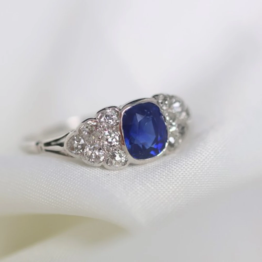 An early 20th century sapphire and diamond ring, the cushion...