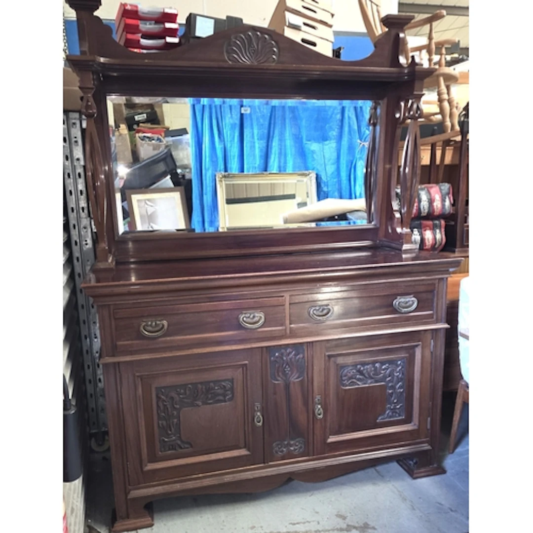 An Art Nouveau mirror back sideboard with split support colo...