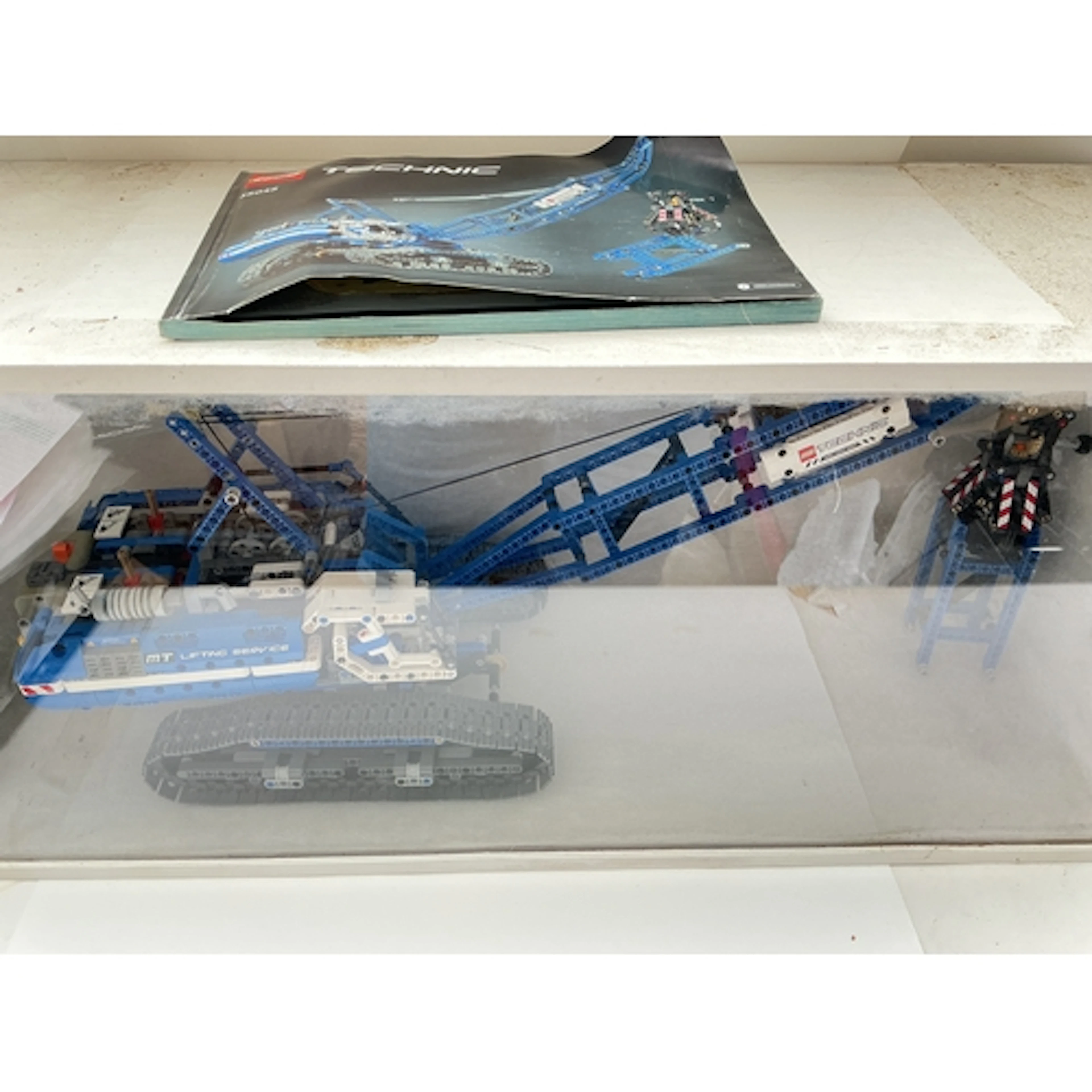 A Lego Technic Crawler Crane #42042 In Display Case With Man...