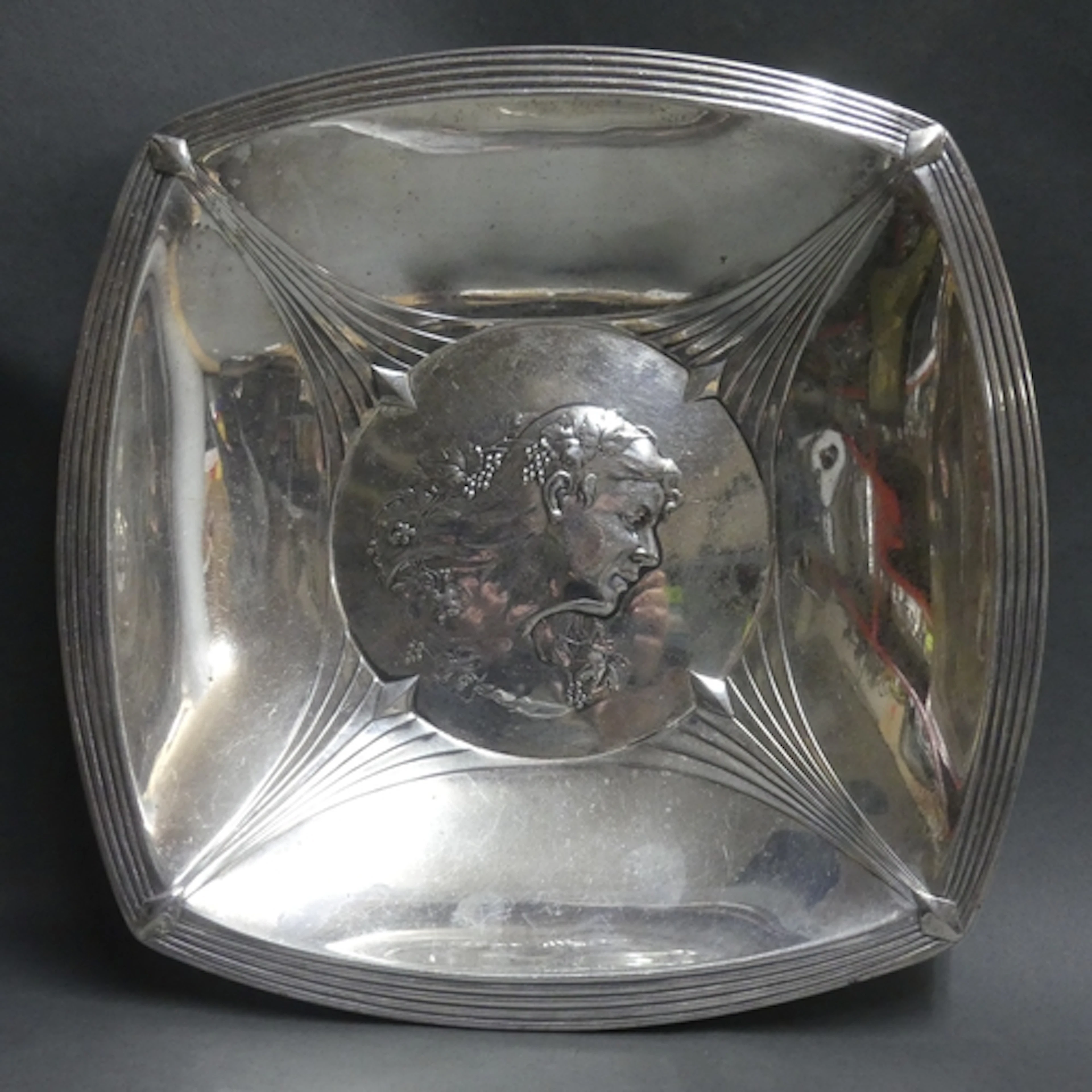 An Art Nouveau silver plated bowl, central Alphonse Mucha de...
