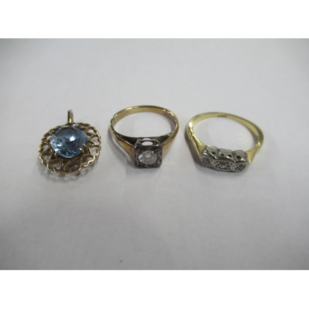 Two 9ct gold gem set rings, together with a gem set pendant,...
