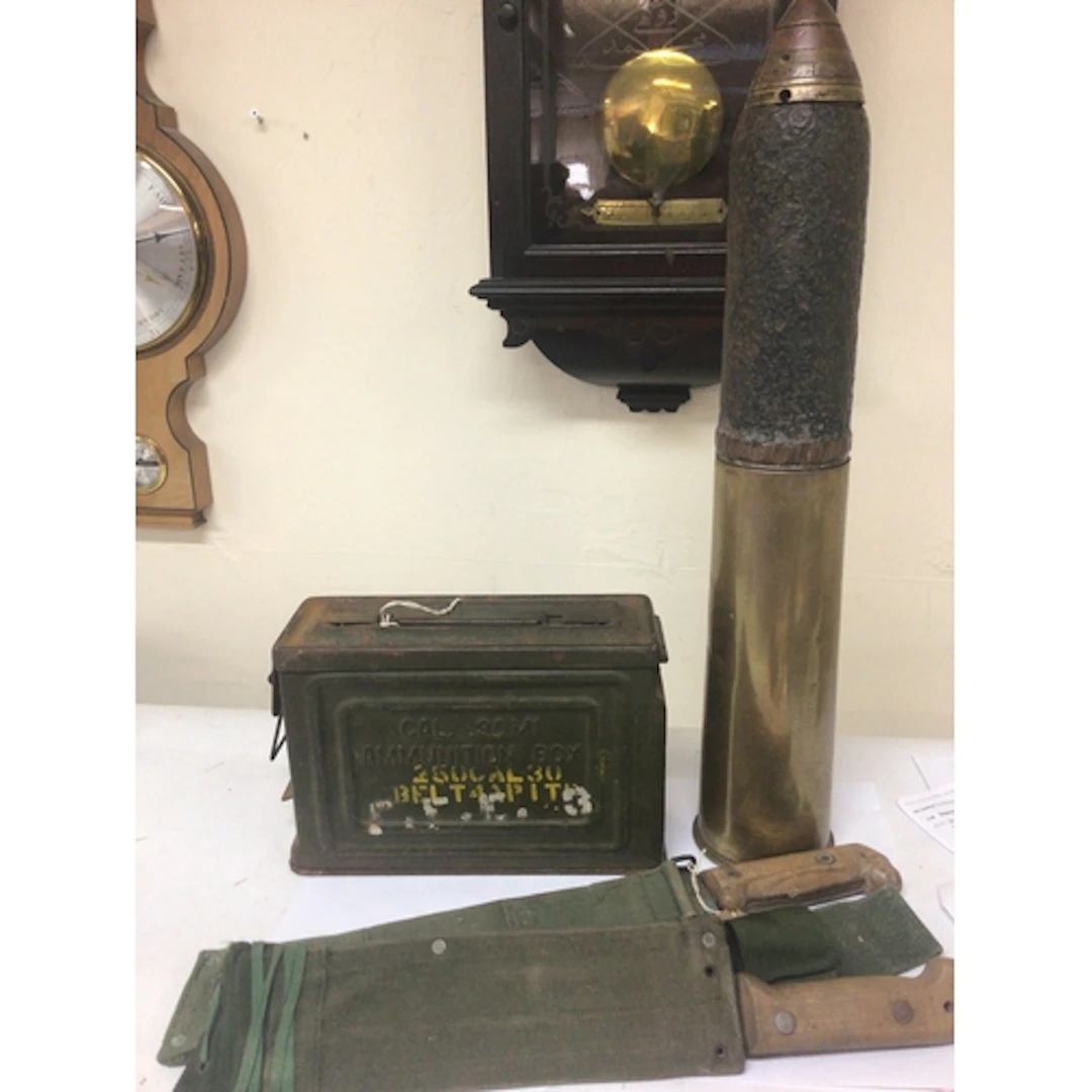 A military ammunition box .30M1 a deactivated shell ca...