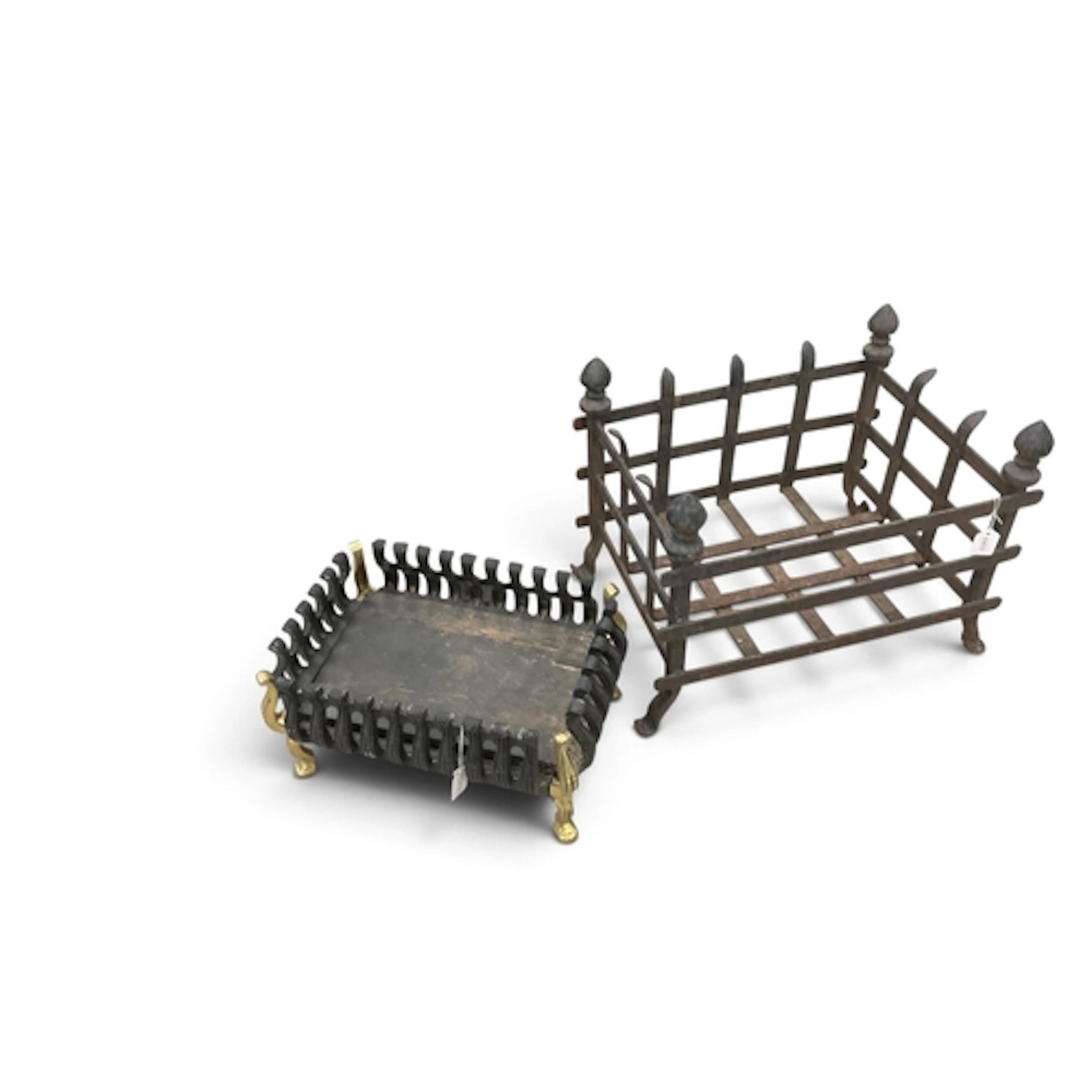 Three cast iron fireplace fire baskets, including a polished...