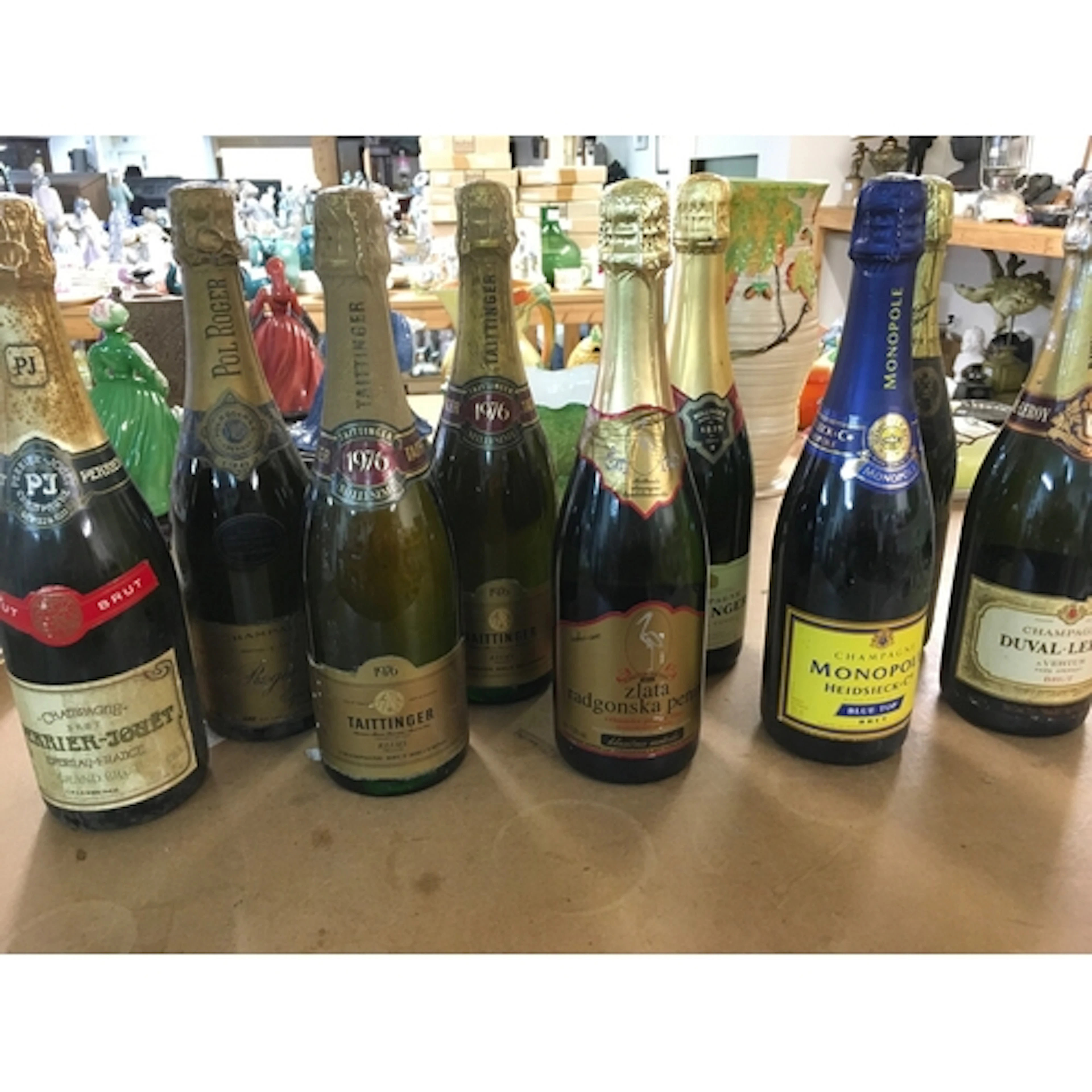 A collection of 9 bottles of assorted champagne including 19...