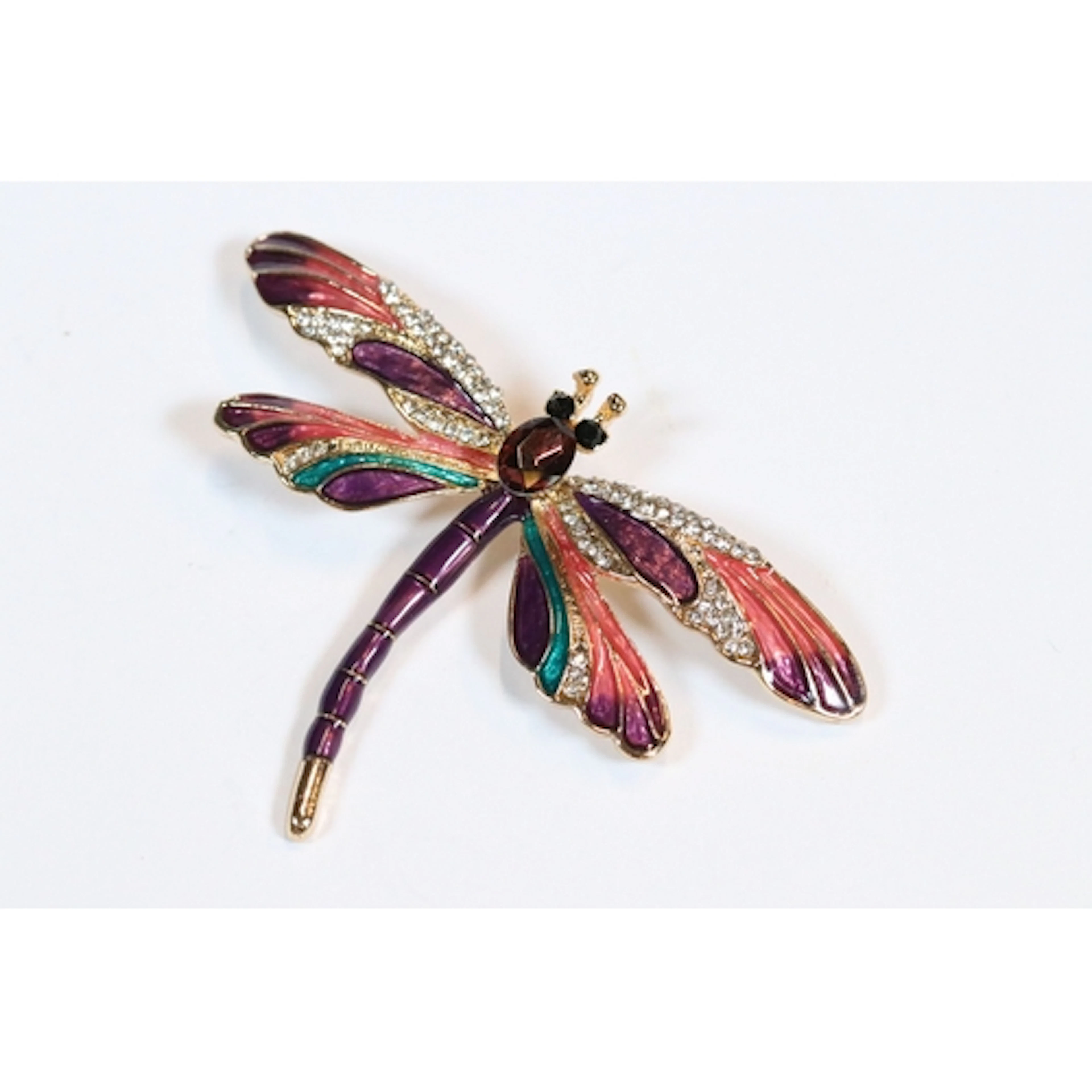 A contemporary gold tone brooch in the form of a Dragonfly, ...