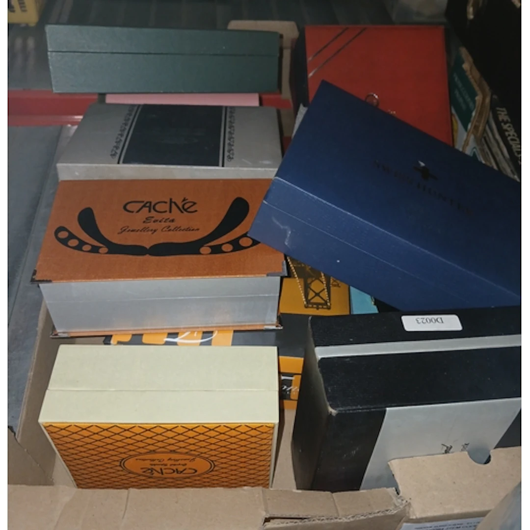 A box of boxed gift sets, many including watches, together w...