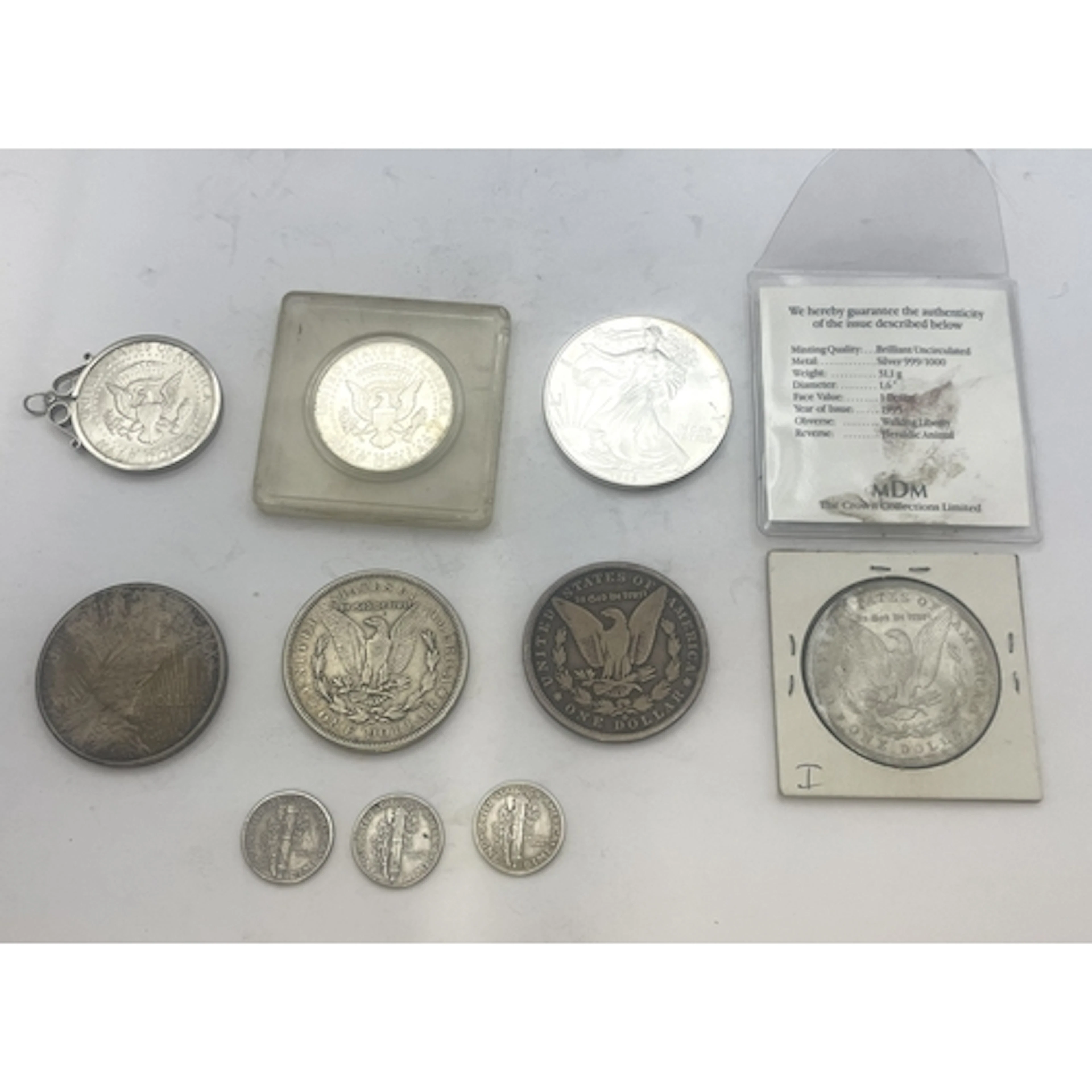 A collection of Silver coins from USA. To include 3 Mercury ...